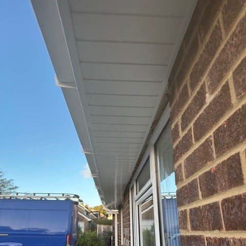 side view from underneath showing the new white tongue and groove cladding