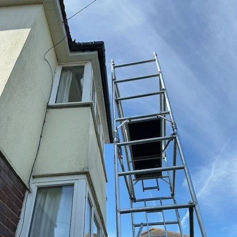 showing our scaffolding set up to the front elevation to fit new fascias and guttering