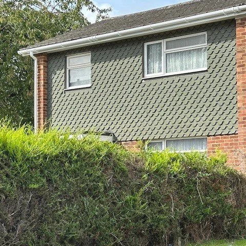 front view of a semi-detached property fitted with new white fascias and white deep flow guttering