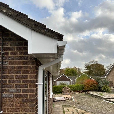 corner view of the property showing a white UPVC bargeboard and one piece box end 