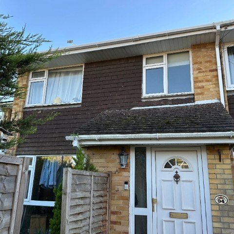 Image shows the front of a property in Southampton Hampshire after white square UPVC guttering replacement, white UPVC fascias and white UPVC tongue and groove soffit replacement