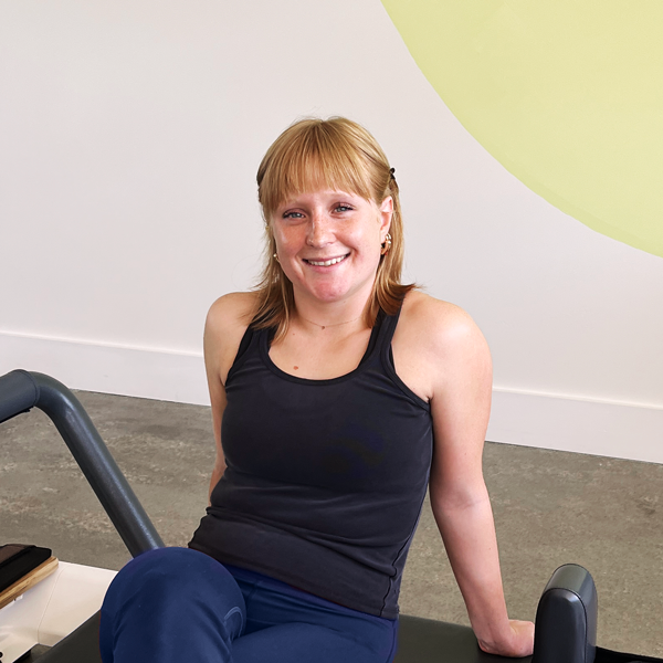 Pascale Pilates instructor at Salt Pilates Studio Balaclava sitting in studio, passionate about mindful movement, strength and body awareness