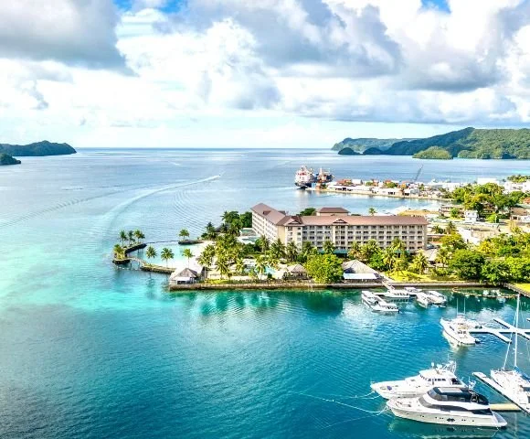 PALAU-Royal-Resort-Aerial-Water-Pier-View-580x480-1.jpg
