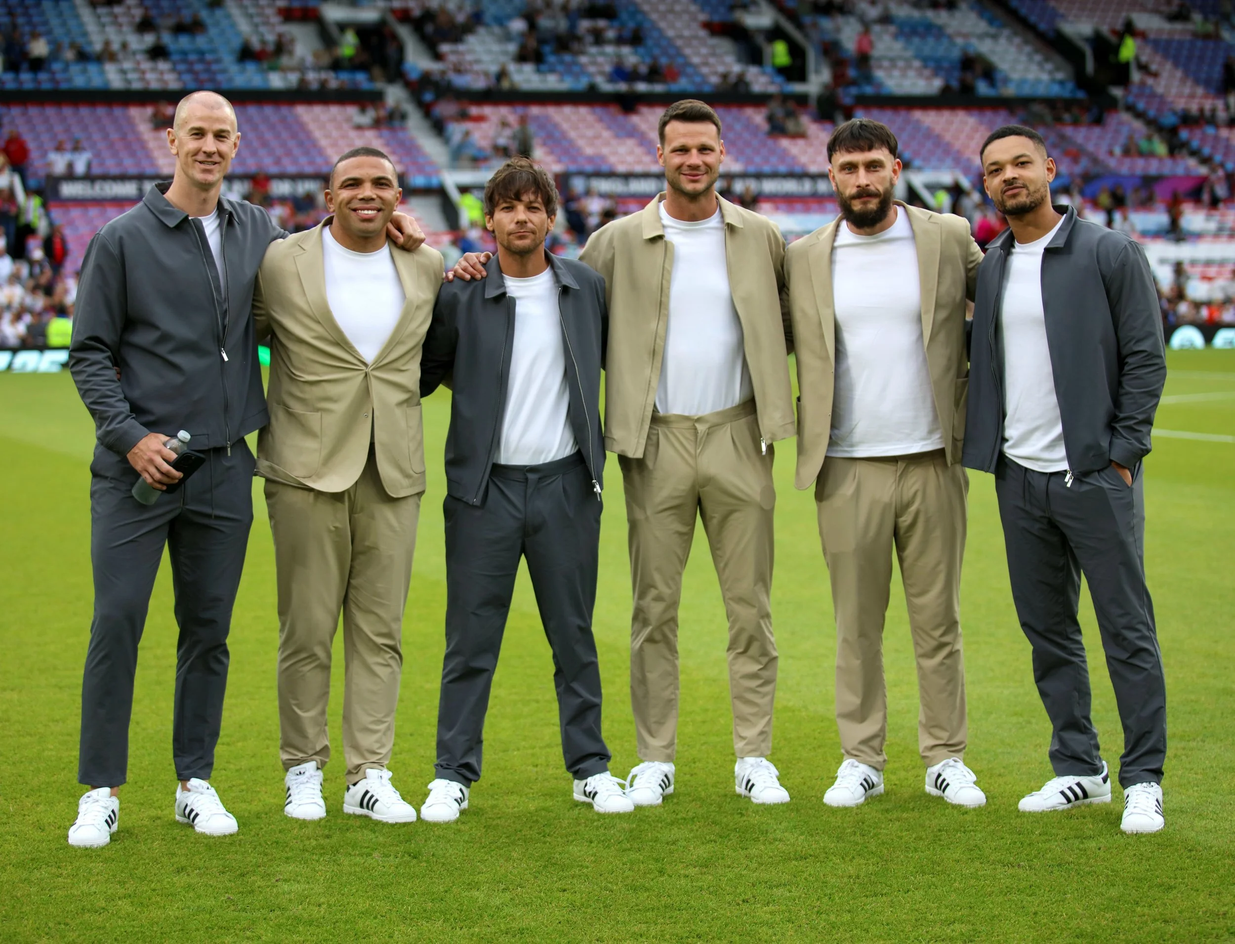 Stars pose prior to kick-off.jpg