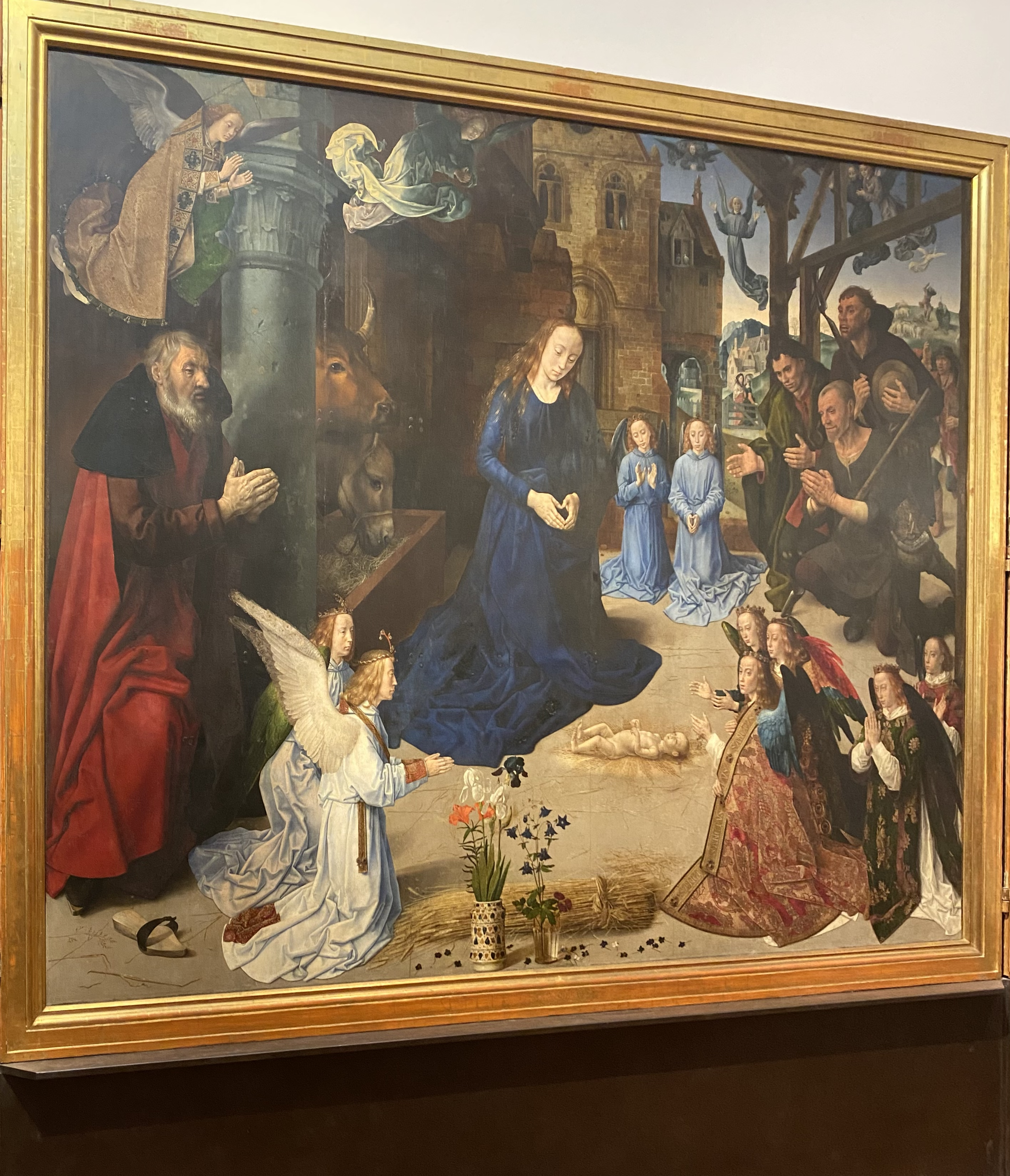 Hugo van der Goes
Adoration of the Shepherds with angels and Saint Thomas, Saint Anthony, Saint Margaret, Mary Magdalen and the Portinari family
Uffizi