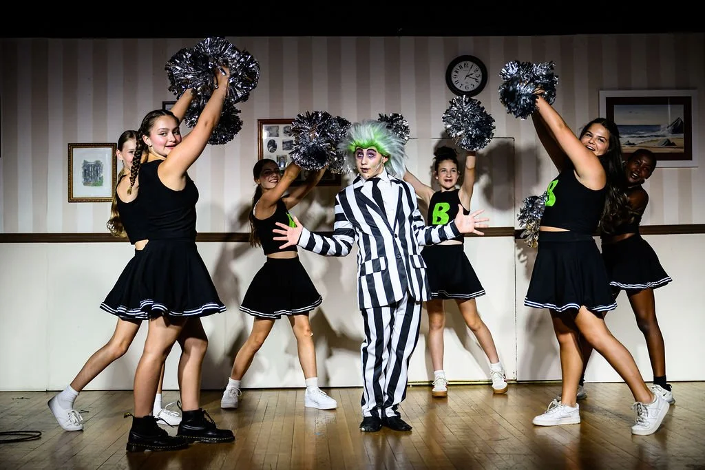 Performance of a group of young cheerleaders