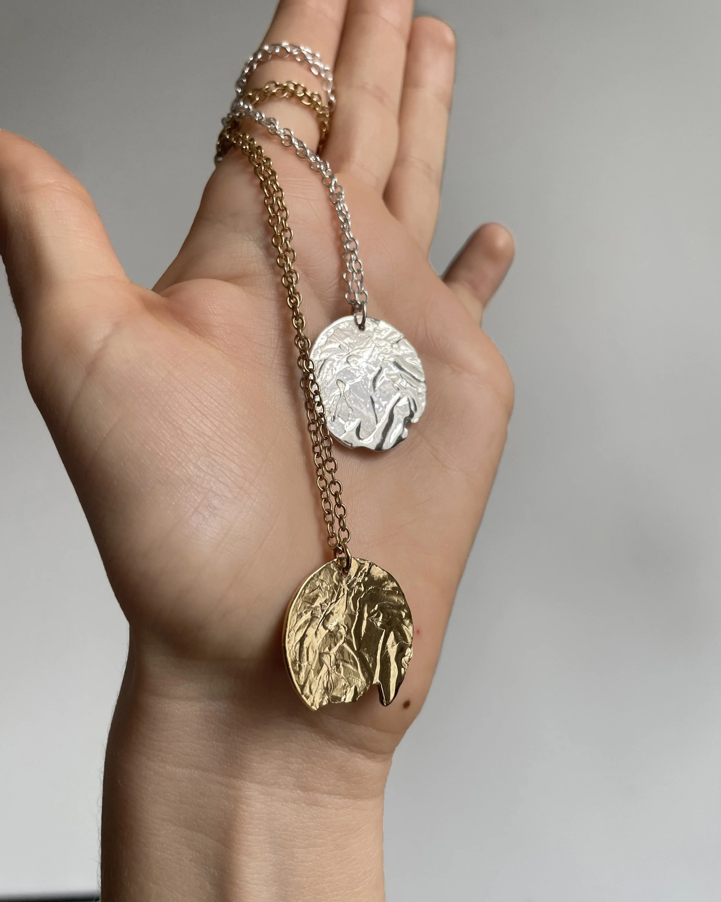 necklaces held edit copy.jpg