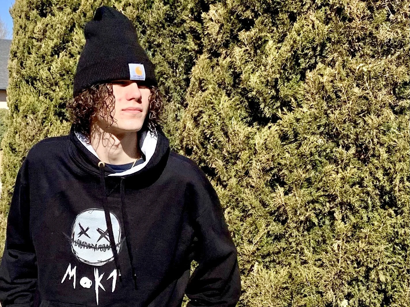 Ashton Welch modeling his clothing intended to support mental health and suicide prevention