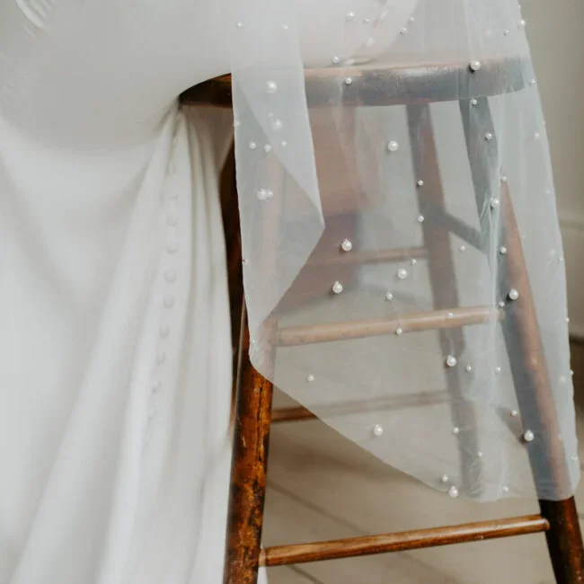 Ruffled-Rose-Veils-Canadian-bridal-veil-designer-handmade-bridal-veils-Lily_beadedpearlcape5-650x650.jpg.webp