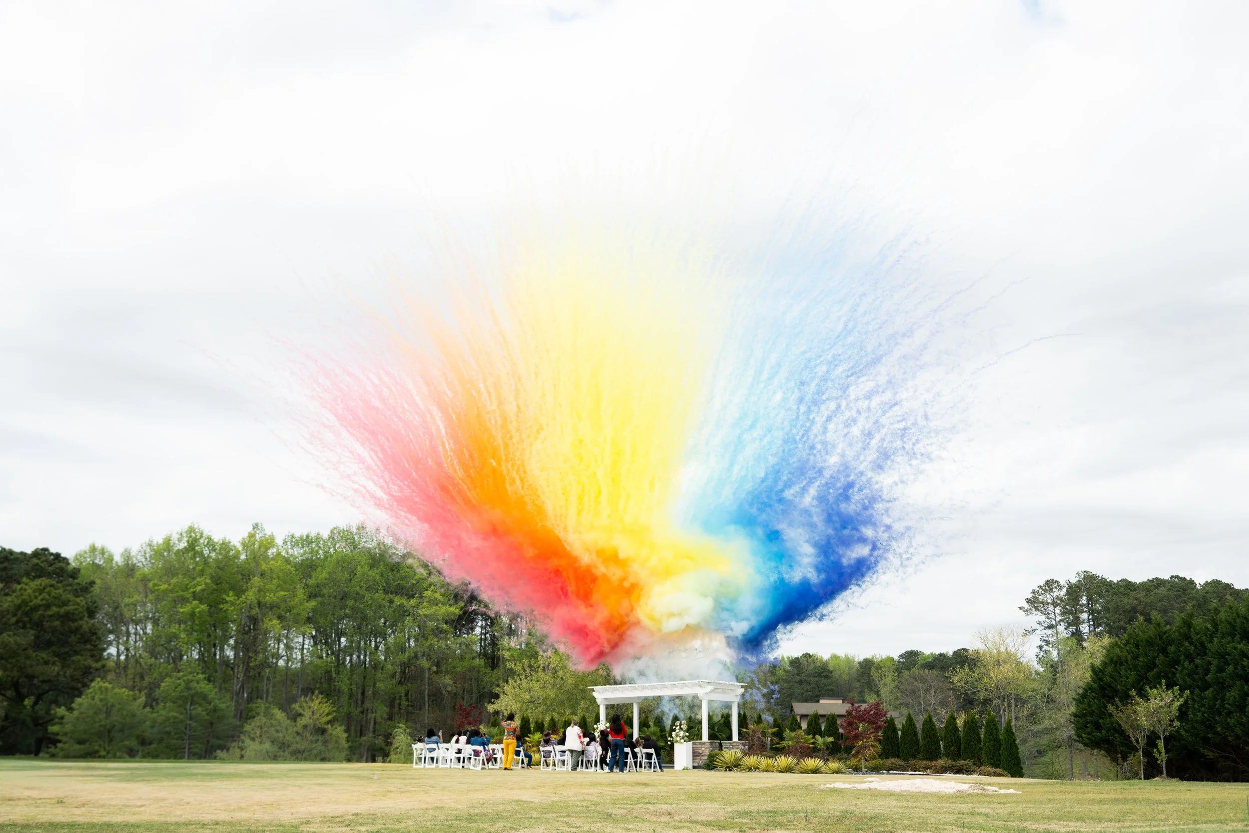 Shot by Michi & Maya Photography at Springview Venue in Dacula, GA of Ayala Balloon Events daytime fireworks demo.
