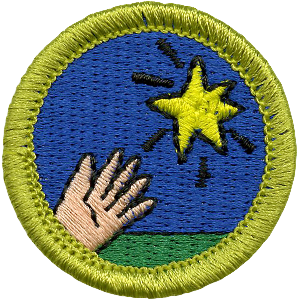 A round embroidered patch with a yellow border, depicting a blue sky with a yellow shooting star and a small hand reaching towards it.