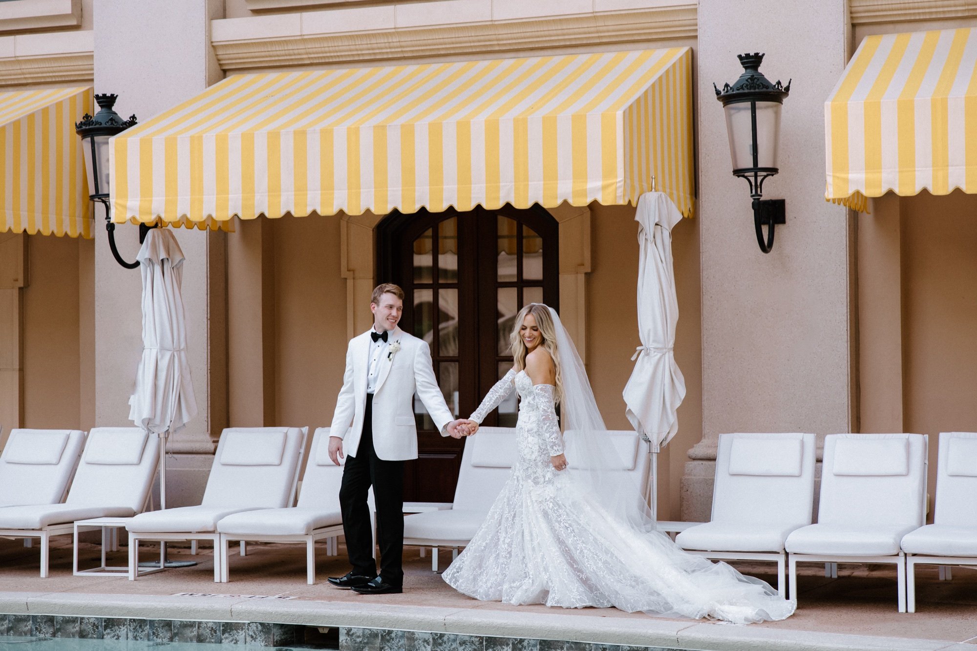 wedding portraits by the pool at st regis hotel