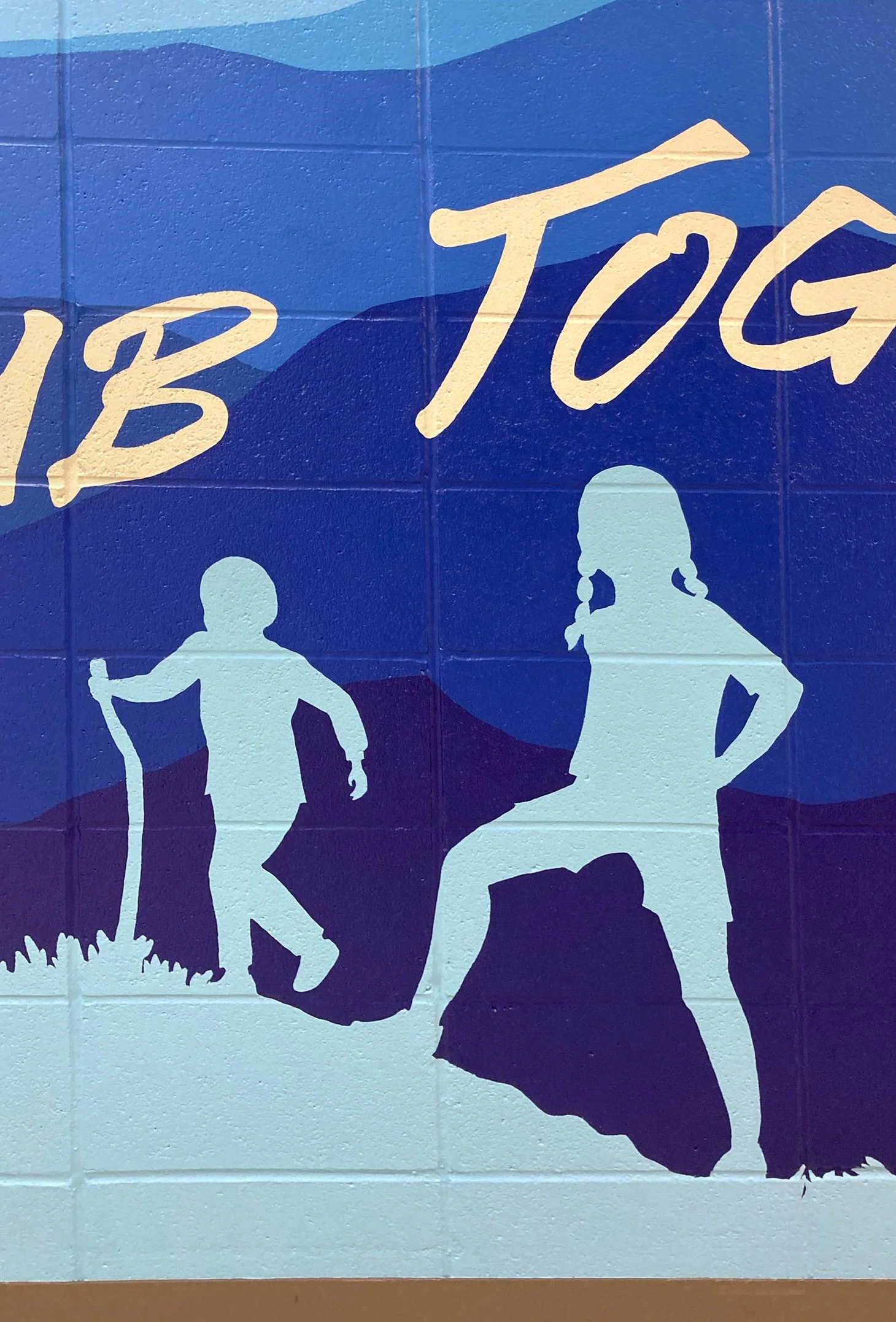 Blue PNW mural by Shelly Metzger Acorn Murals. Best mural artist Kent, best mural artist KSD, Kent School District, Best mural artist in Washington State, ombre mural. Mountain mural, mountaineers, Martin Sortun Elementary School, School Mural, Best 