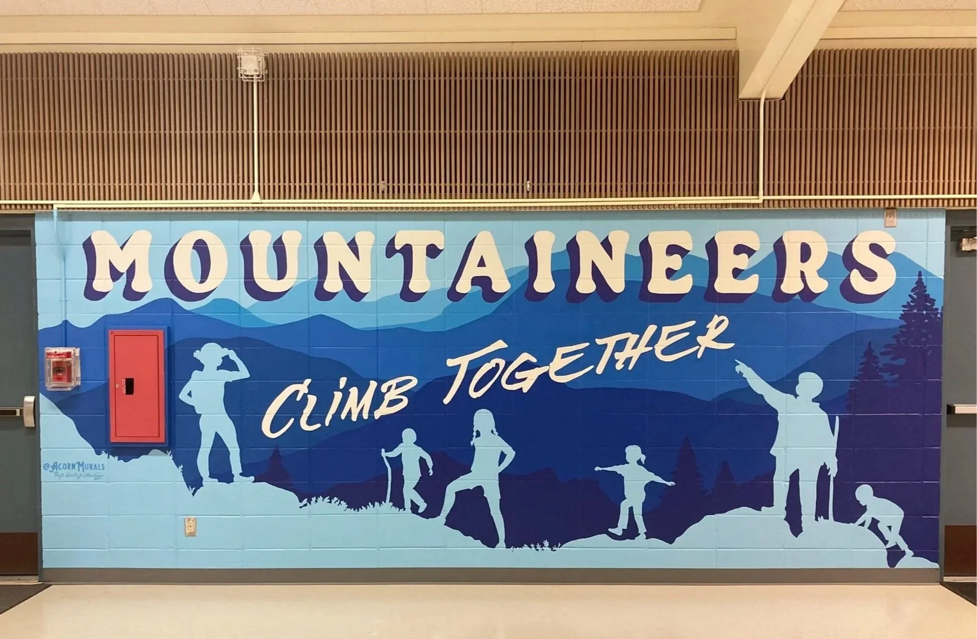 Blue PNW mural by Shelly Metzger Acorn Murals. Best mural artist Kent, best mural artist KSD, Kent School District, Best mural artist in Washington State, ombre mural. Mountain mural, mountaineers, Martin Sortun Elementary School, School Mural, Best 