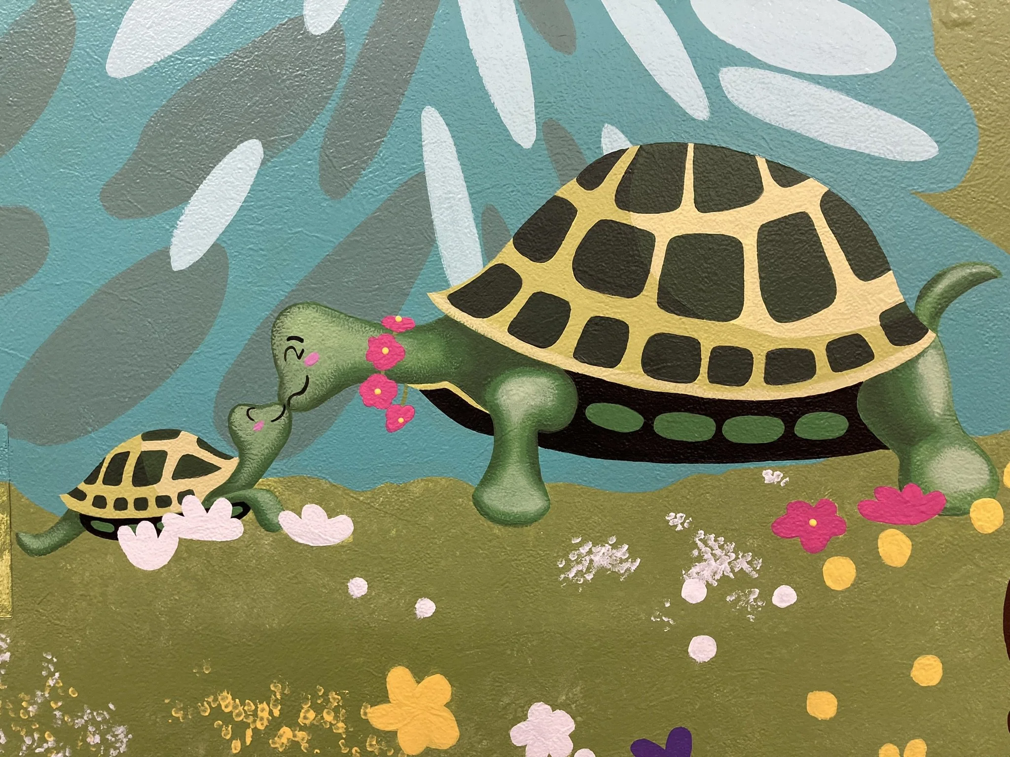 Close up of a mural showing a mama turtle and baby turtle that love each other by Shelly Metzger by Acorn Murals