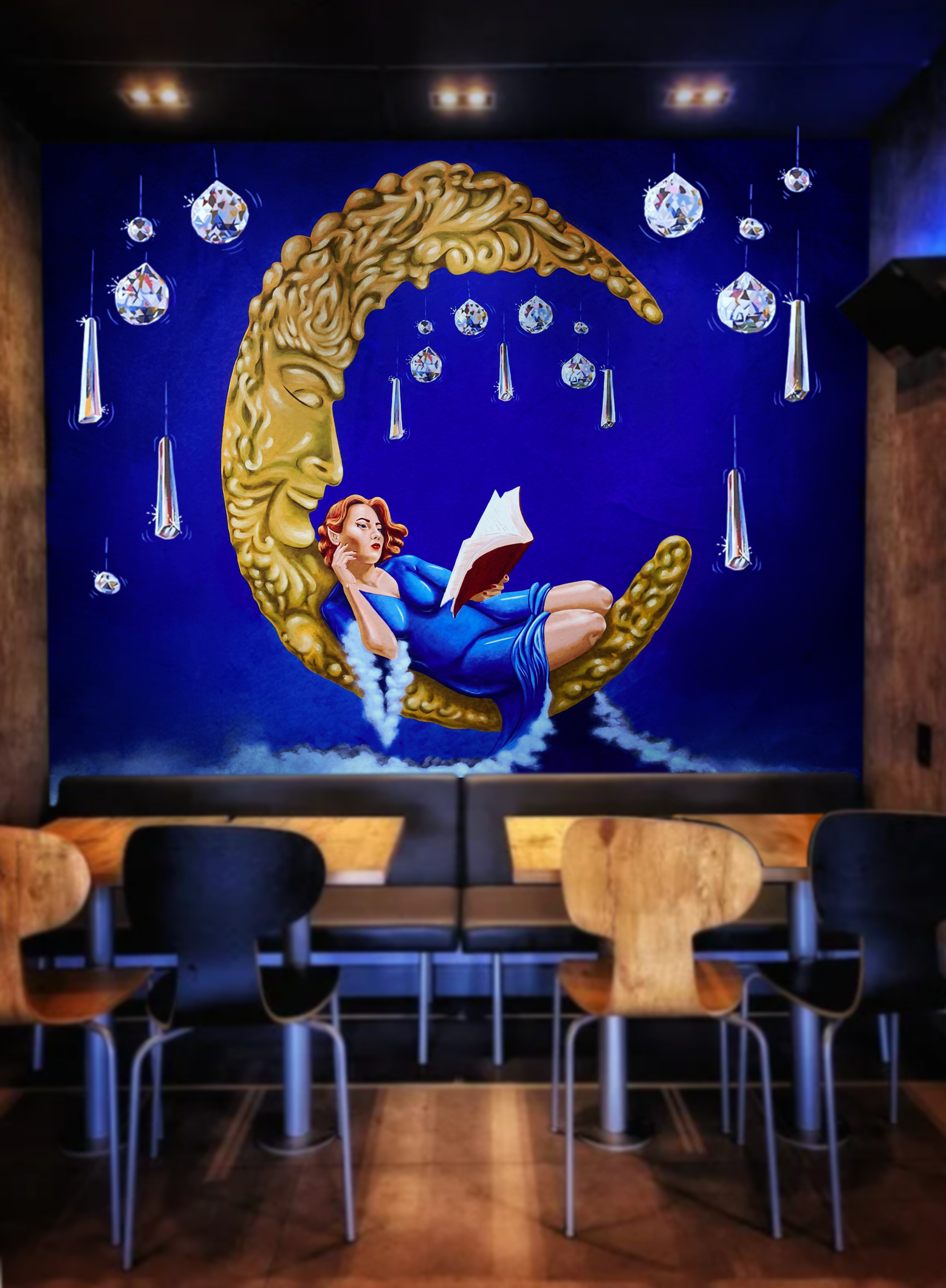 Cafe interior with mural concept depicting a woman reading on a crescent moon and hanging teardrop crystals. Created from Shelly Metzger's fine art painting Moonshine @AcornMurals #AcornMurals