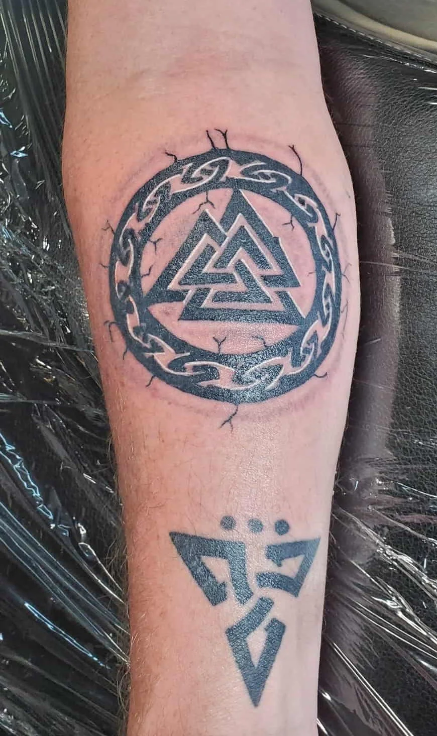 inscription pattern tattoo done by a Redding tattoo artist