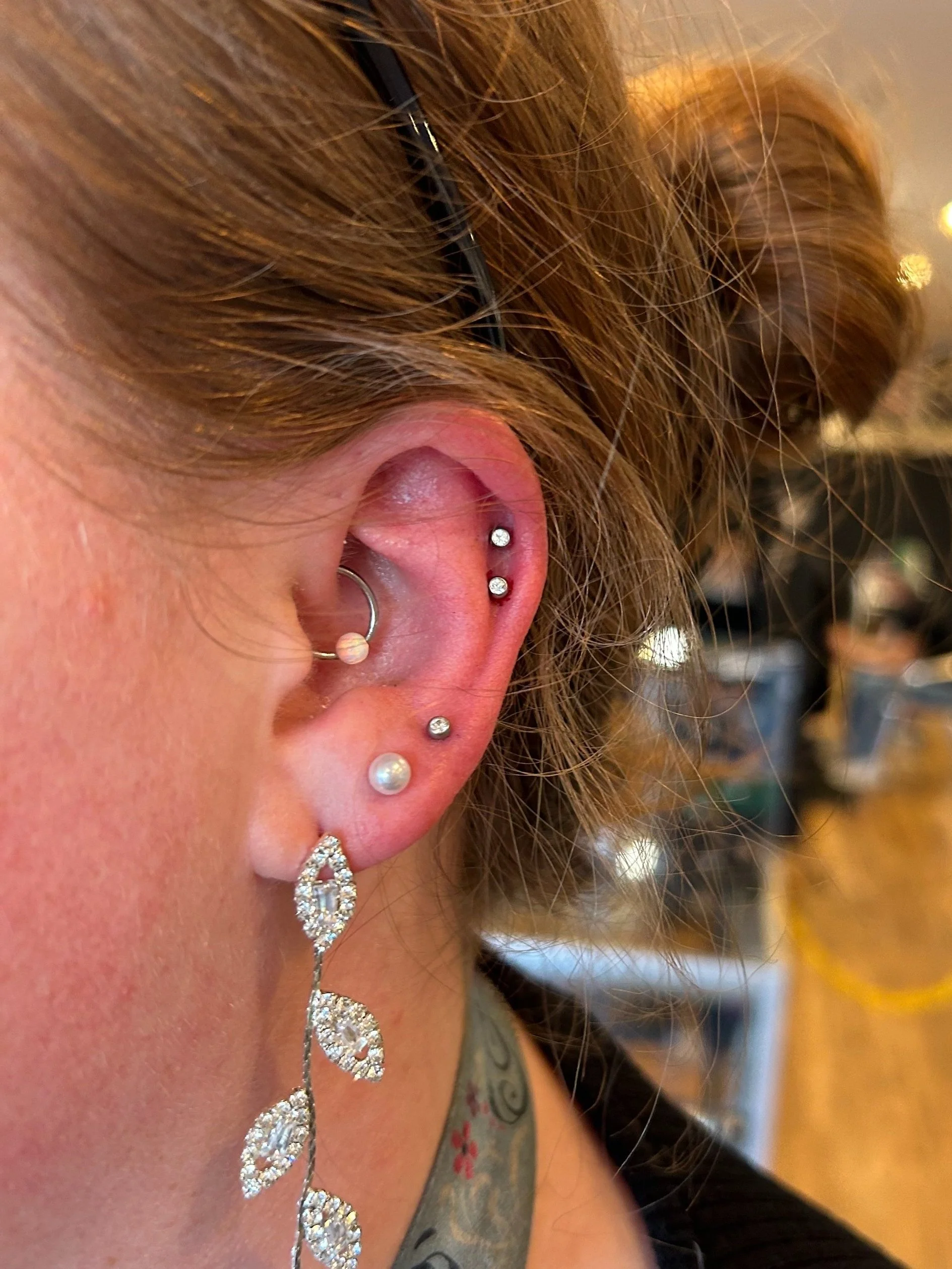Daith, double helix piercing