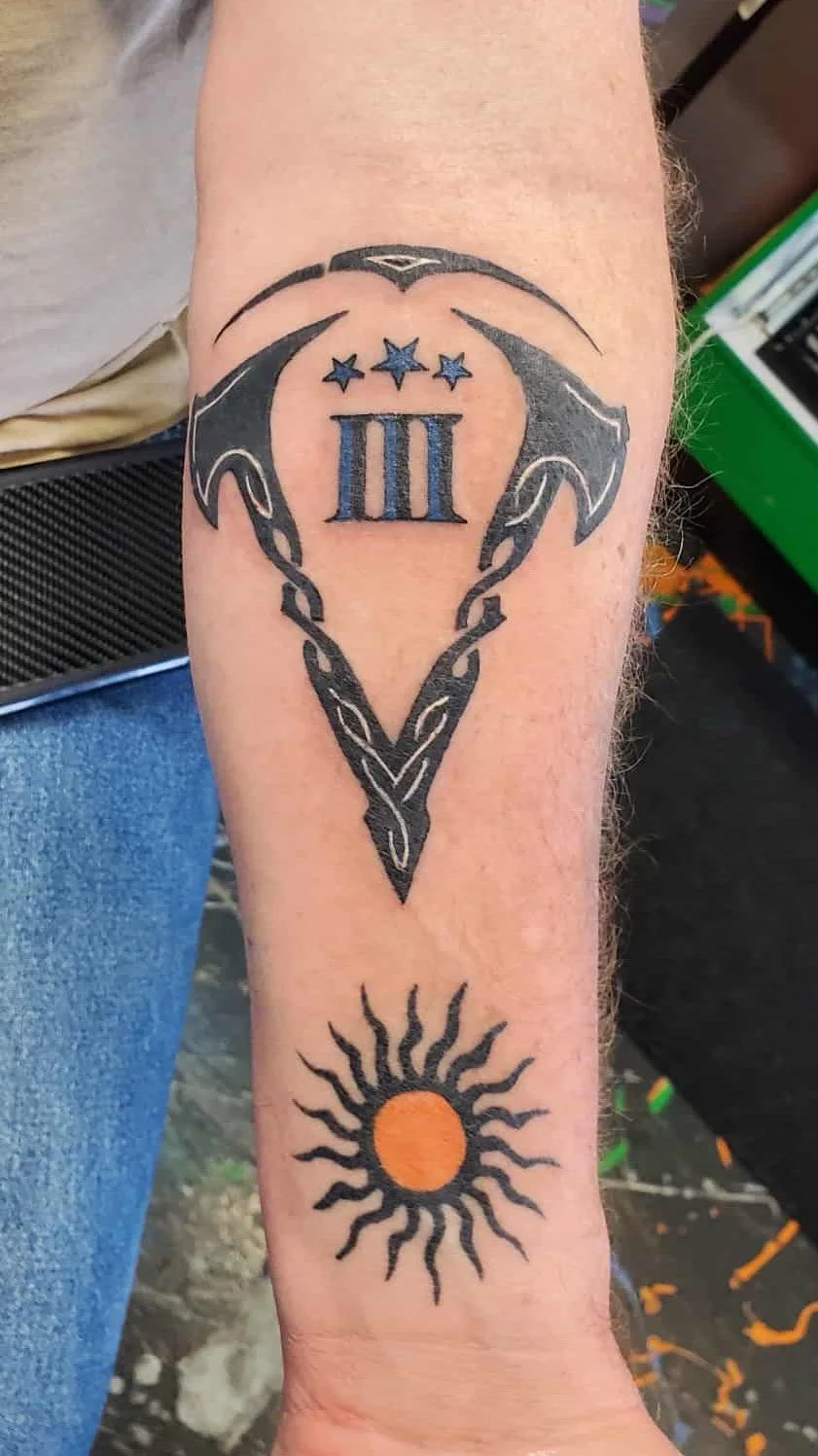 Viking axes tattoo done by a Redding tattoo artist