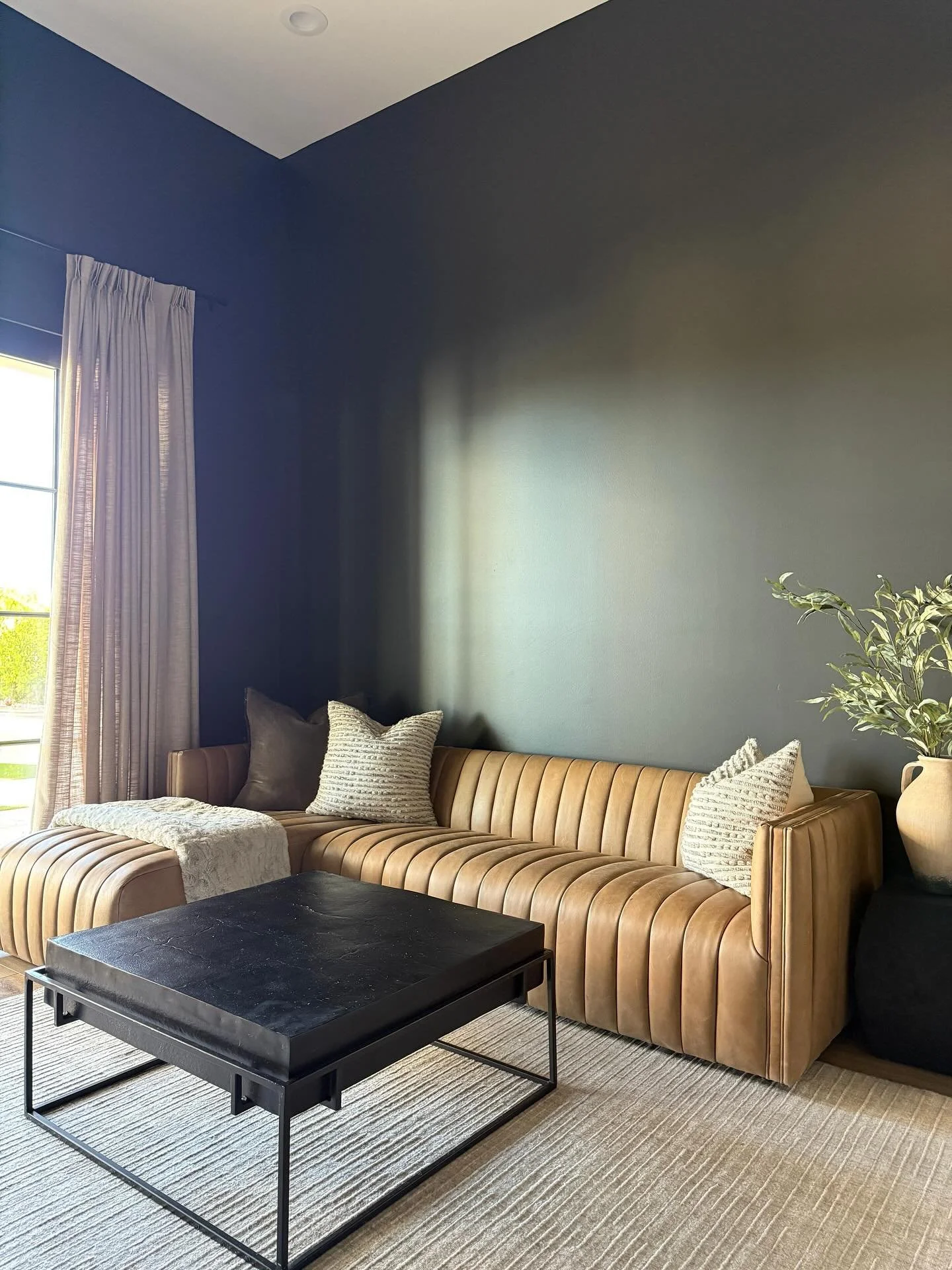 Bringing sophistication and intentional design to this lounge through layered textures and moody finishes. 
We have created a lounge area that is timeless for our clients family as they grow and mature into their teenage years! 
#interiordesigner #