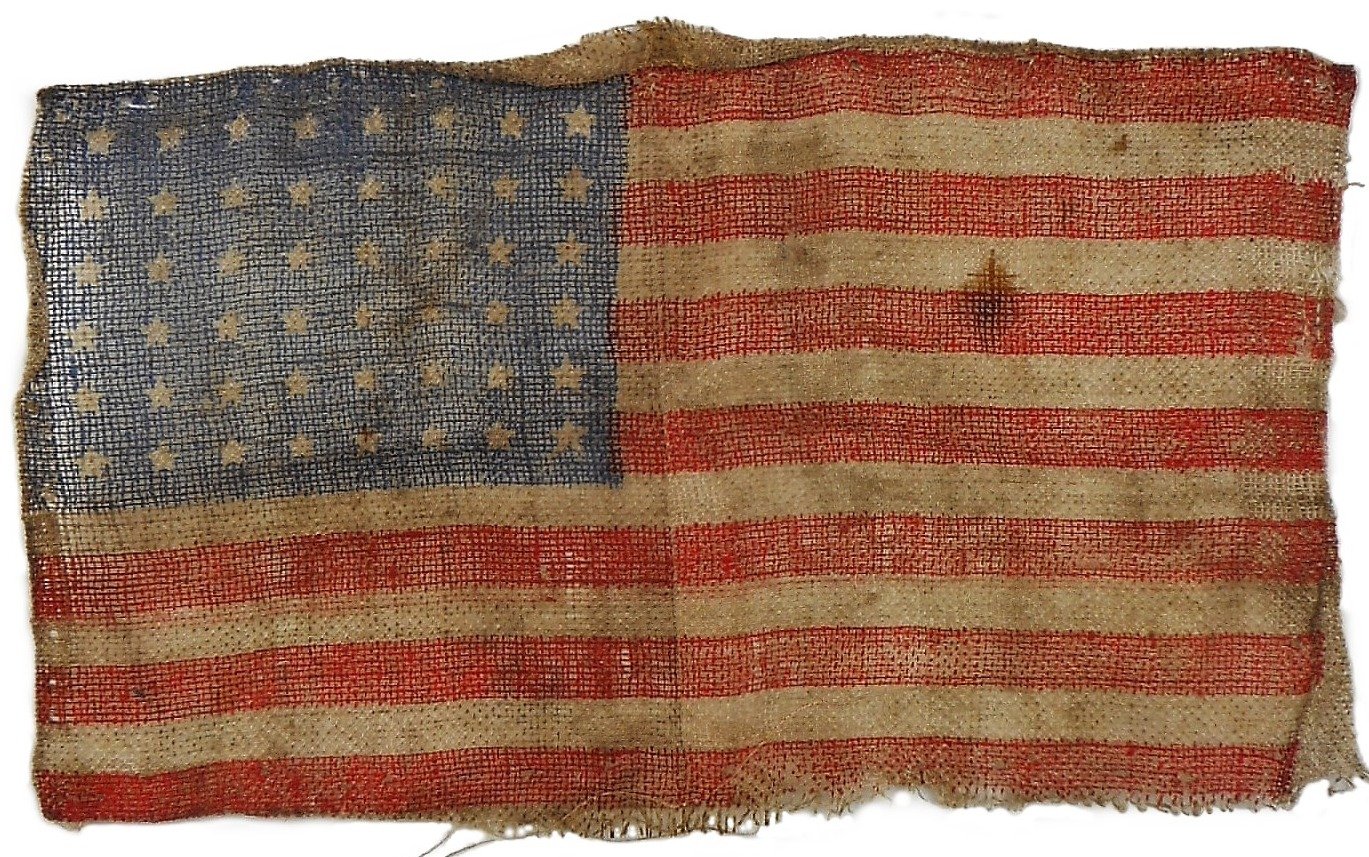 This small US 48 star flag, printed on gauze, was worn by veteran 82nd Airborne paratrooper Albert Larson from Minneapolis when he jumped into Normandy with "B" Co. 505th Parachute Infantry Regiment outside of the small town of Ste. Mere Eg