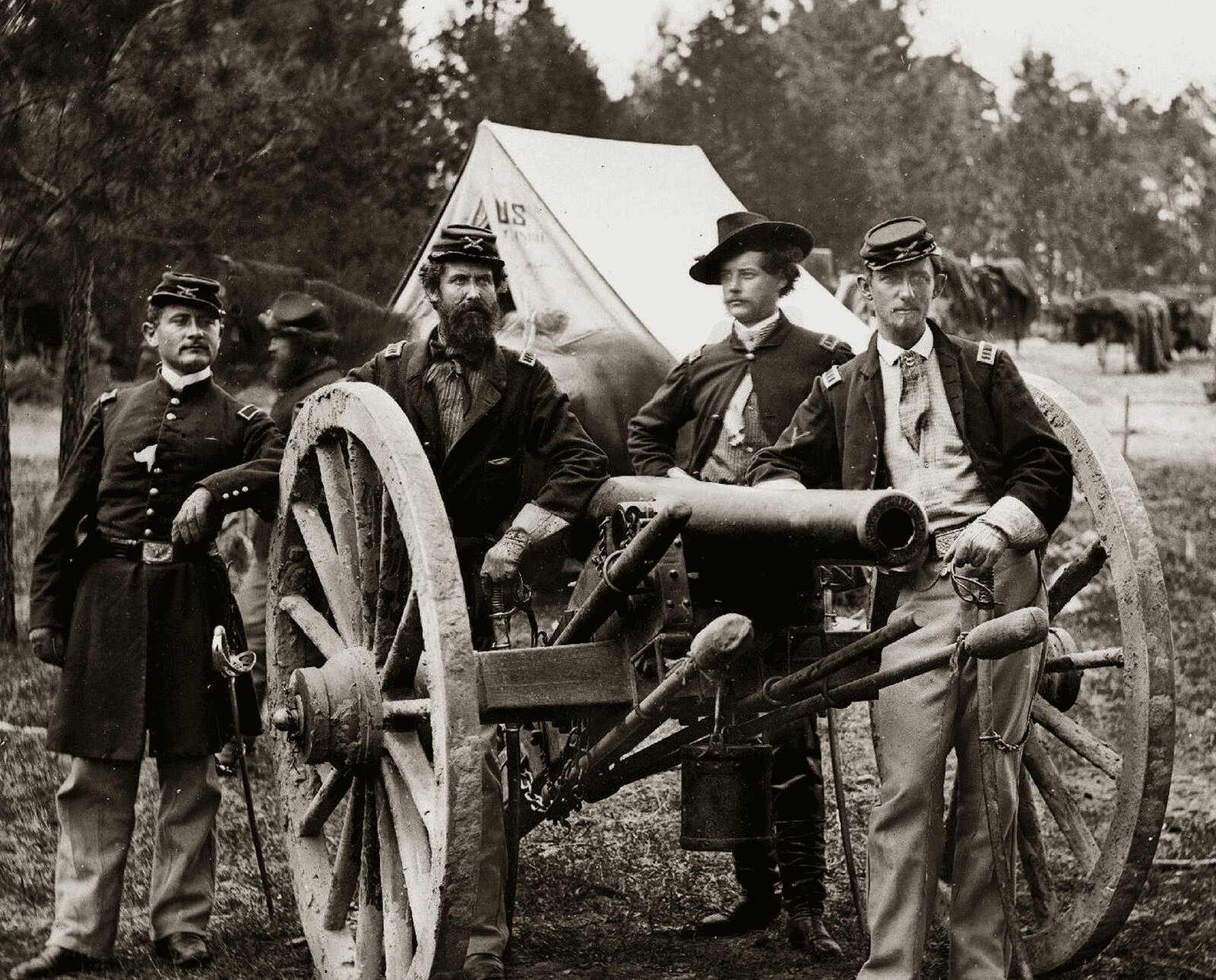 Civil War soldiers with cannon posing. Civil War photo from that era.