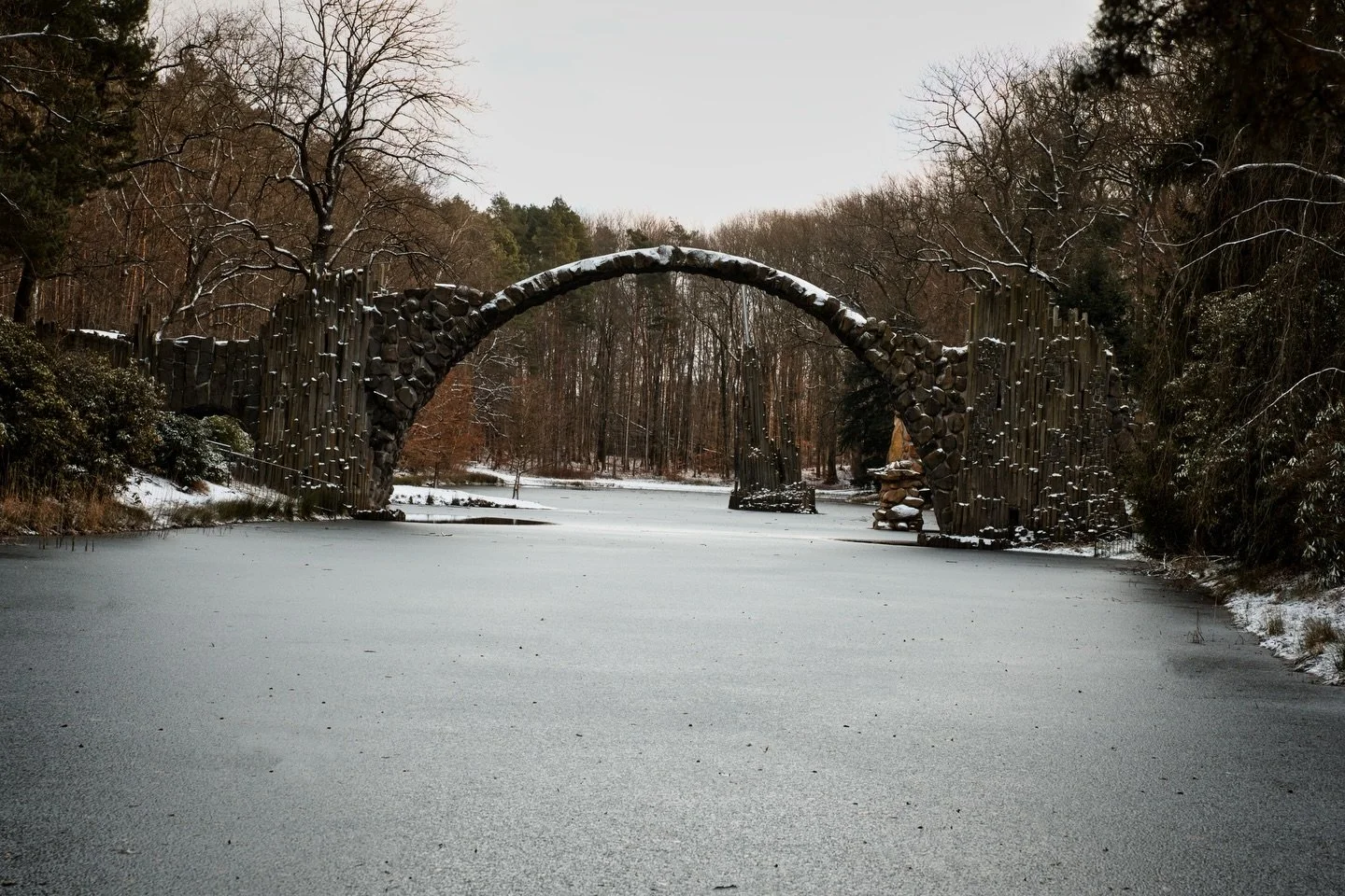 📍 Gablenz, Saxony, Germany 

Today some photos of the Rakotzbr&uuml;cke in the Rhododendronpark between Gablenz and Kromlau, Germany.

I visited this place in different times of the year and I am always impressed with this construction.

Either end 