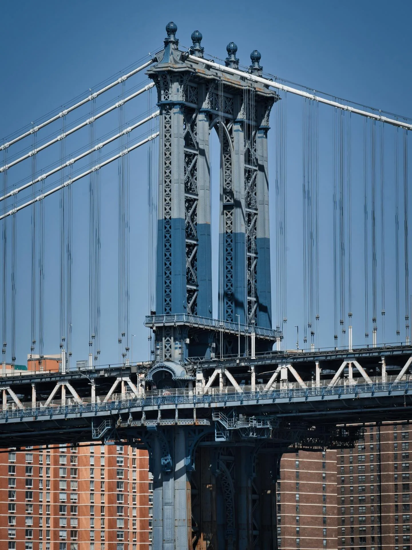 📍 New York, NY, USA

Today some photos featuring the Manhattan Bridge in NYC, USA.

The Manhattan Bridge stands as a monumental achievement of early 20th-century engineering, distinguished by its innovative use of the &ldquo;deflection theory.&rdquo
