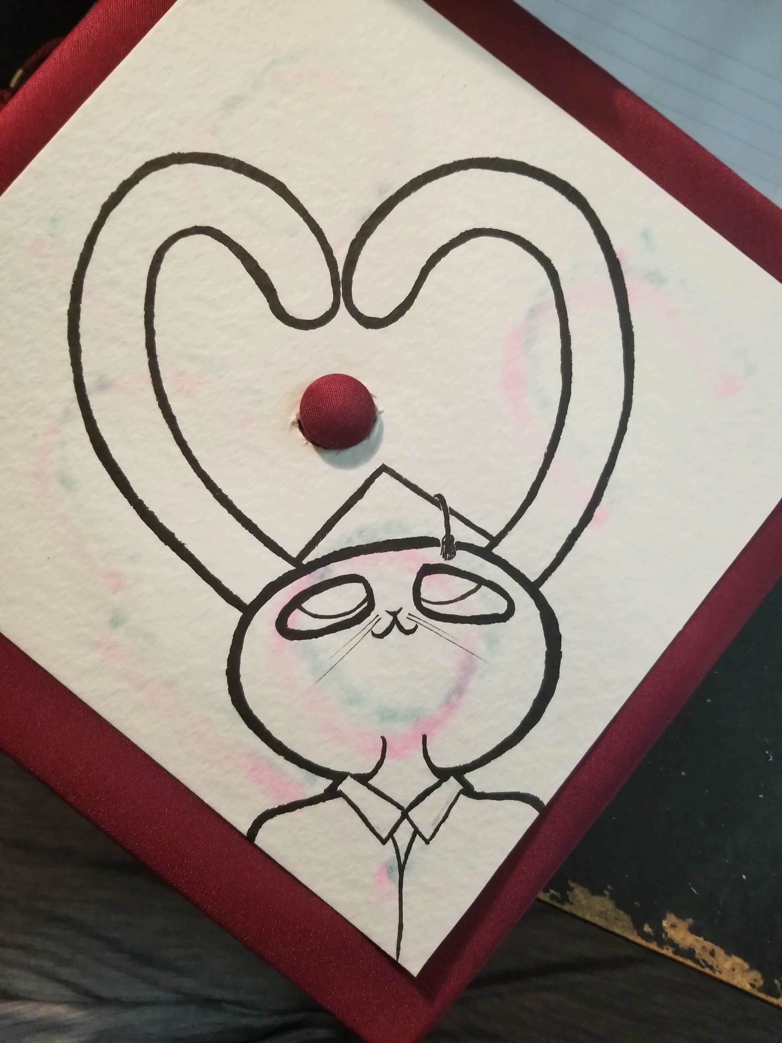 grad cap (heart side)