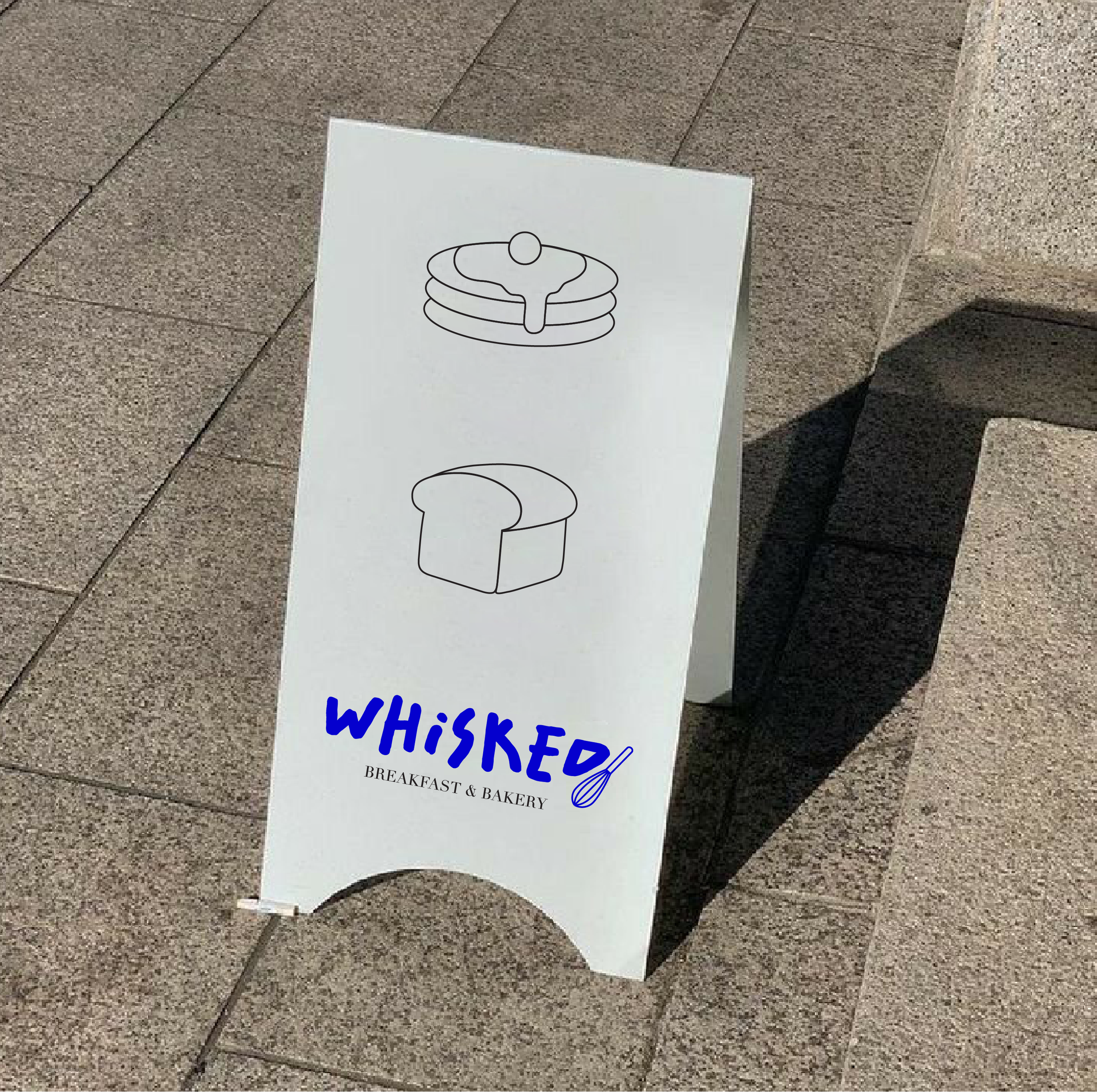 storefront signage design for a breakfast and bakery