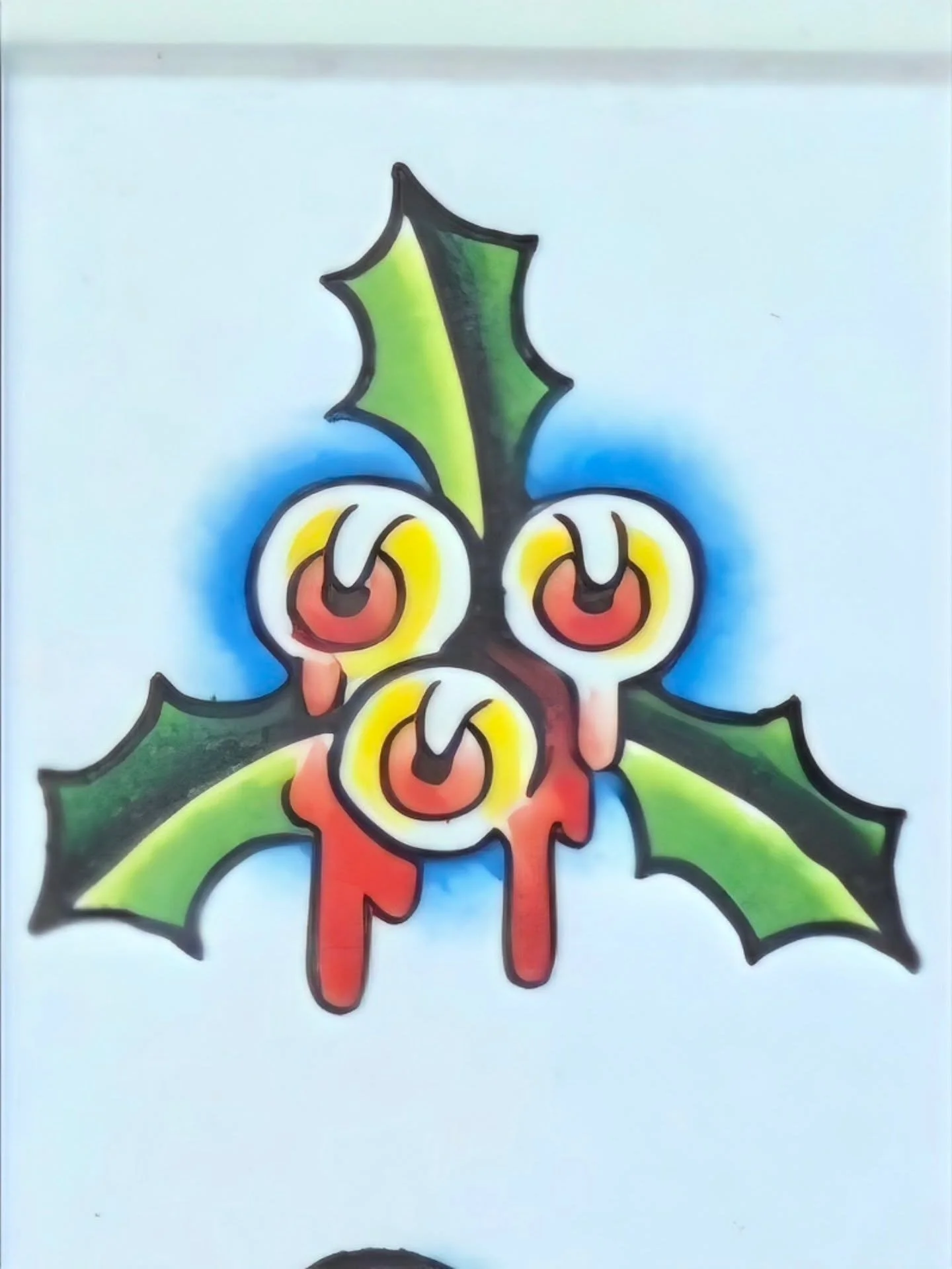 Colorful graffiti of three cartoonish eyes with dripping red tears on a white surface, with green holly leaves at the top.