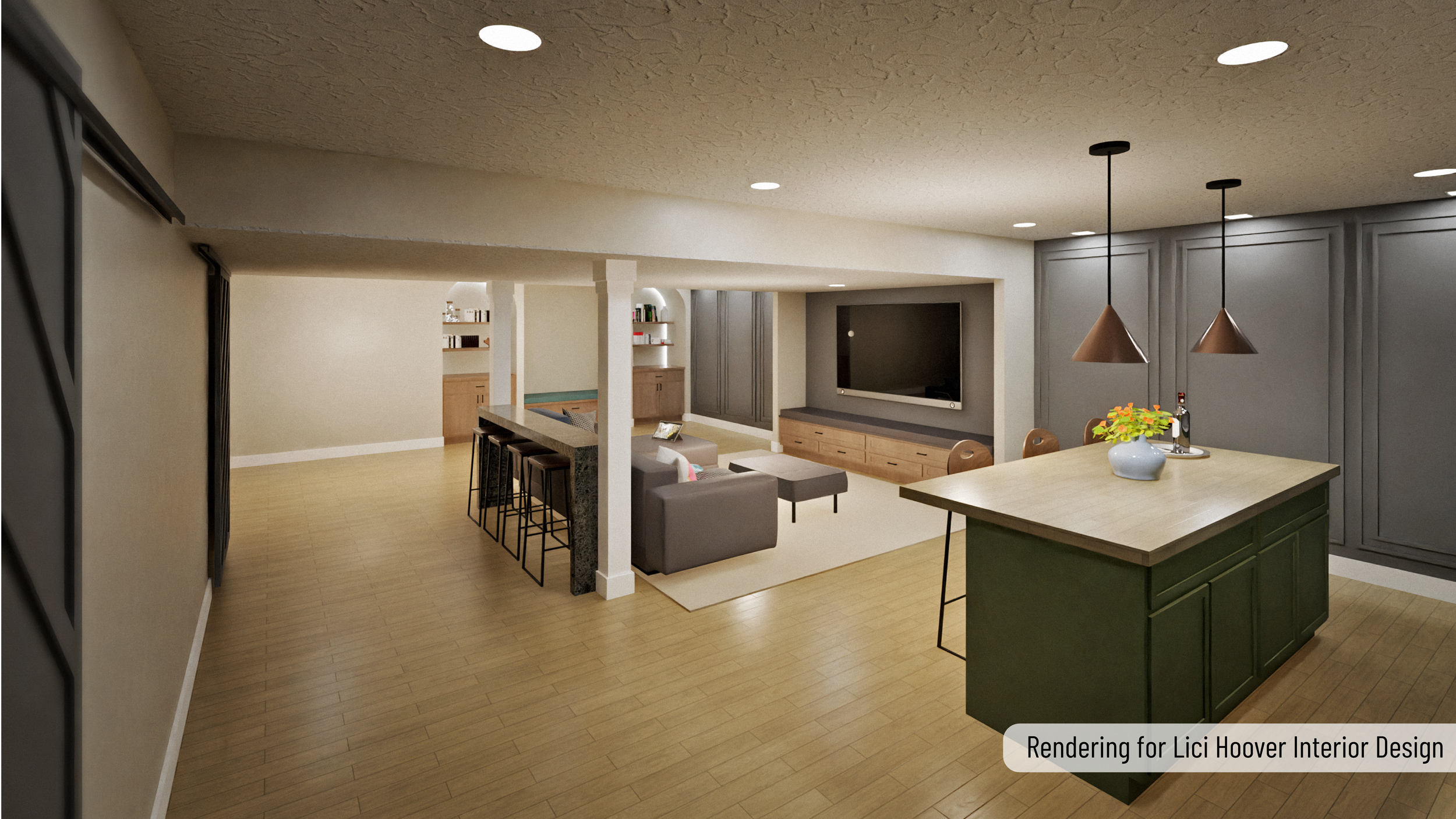 Interior view of a modern open-plan living space with a kitchen island, bar stools, a TV with a media console, gray walls, and wooden flooring.
