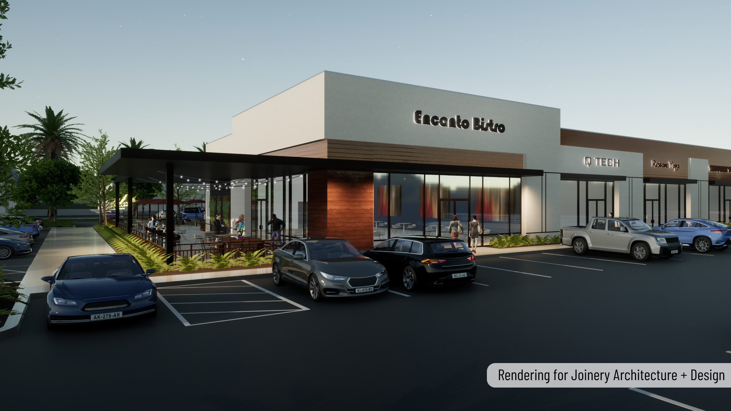 A modern shopping plaza with a parking lot in front, featuring multiple cars parked and a building with large glass windows and signage that reads 'Encanto Lido', 'Q TECH', and 'Restore Yoga'. There are trees and outdoor seating under a covered patio