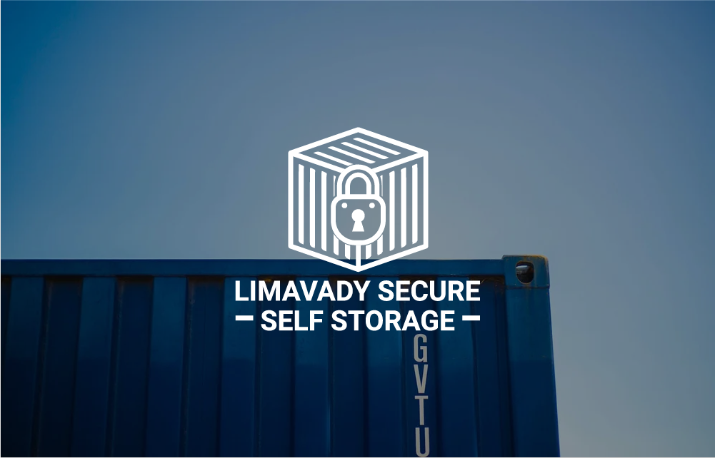 A blue shipping container with white text and logo for Limavady Secure Self Storage, with a clear sky in the background.