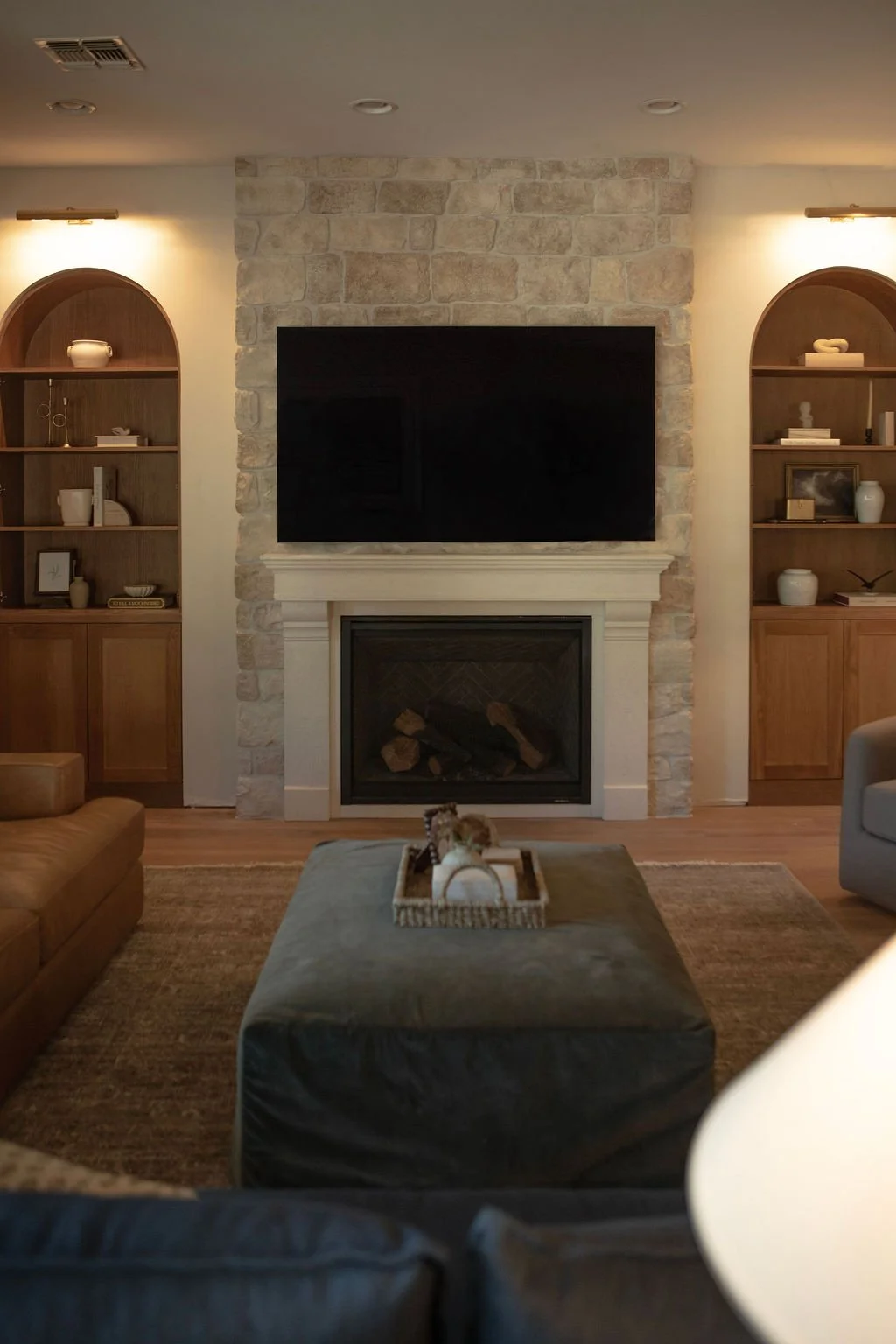 Renovated living room with relocated fireplace and improved flow.jpg