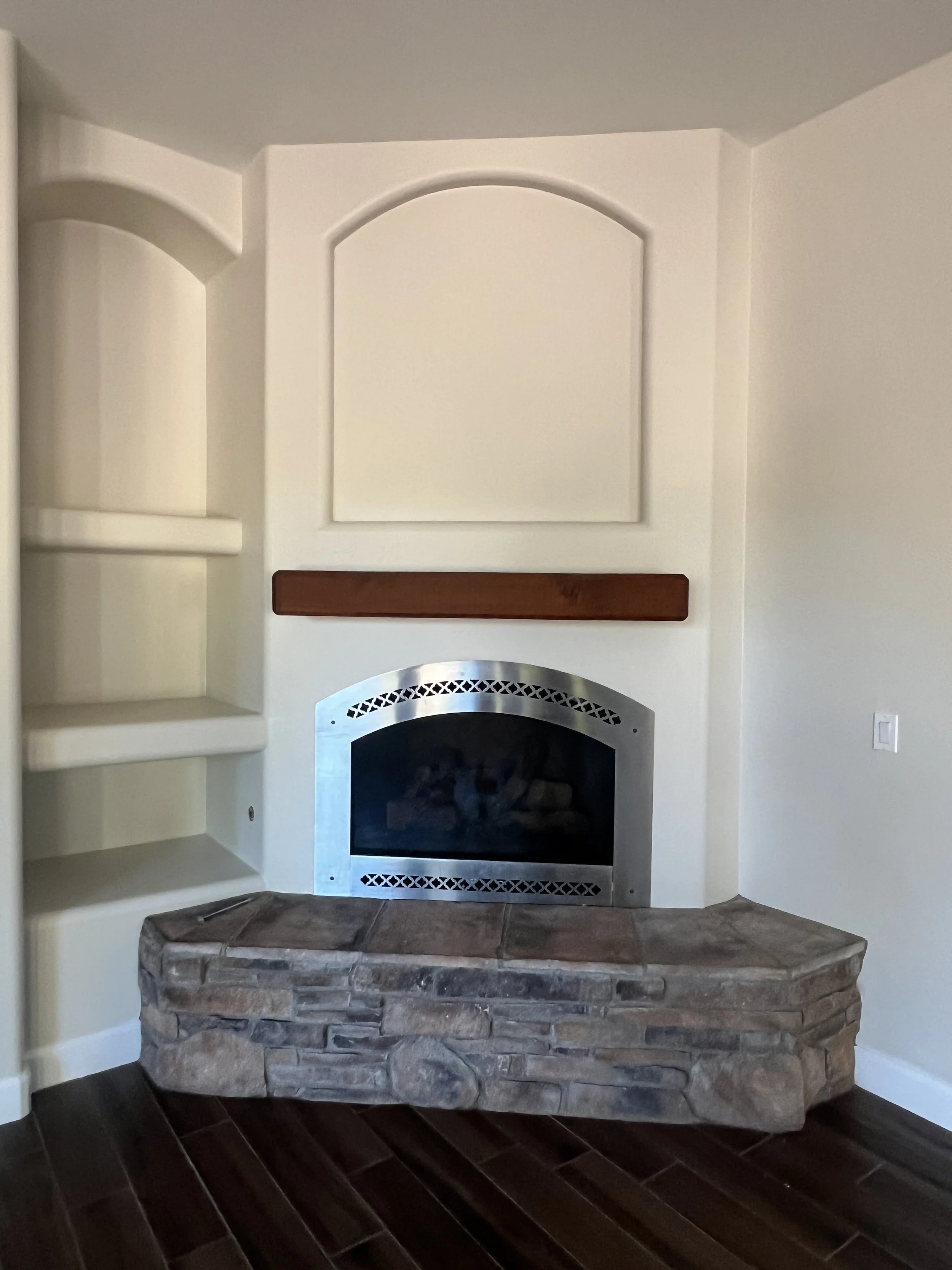 Original living room layout before redesign and fireplace relocation