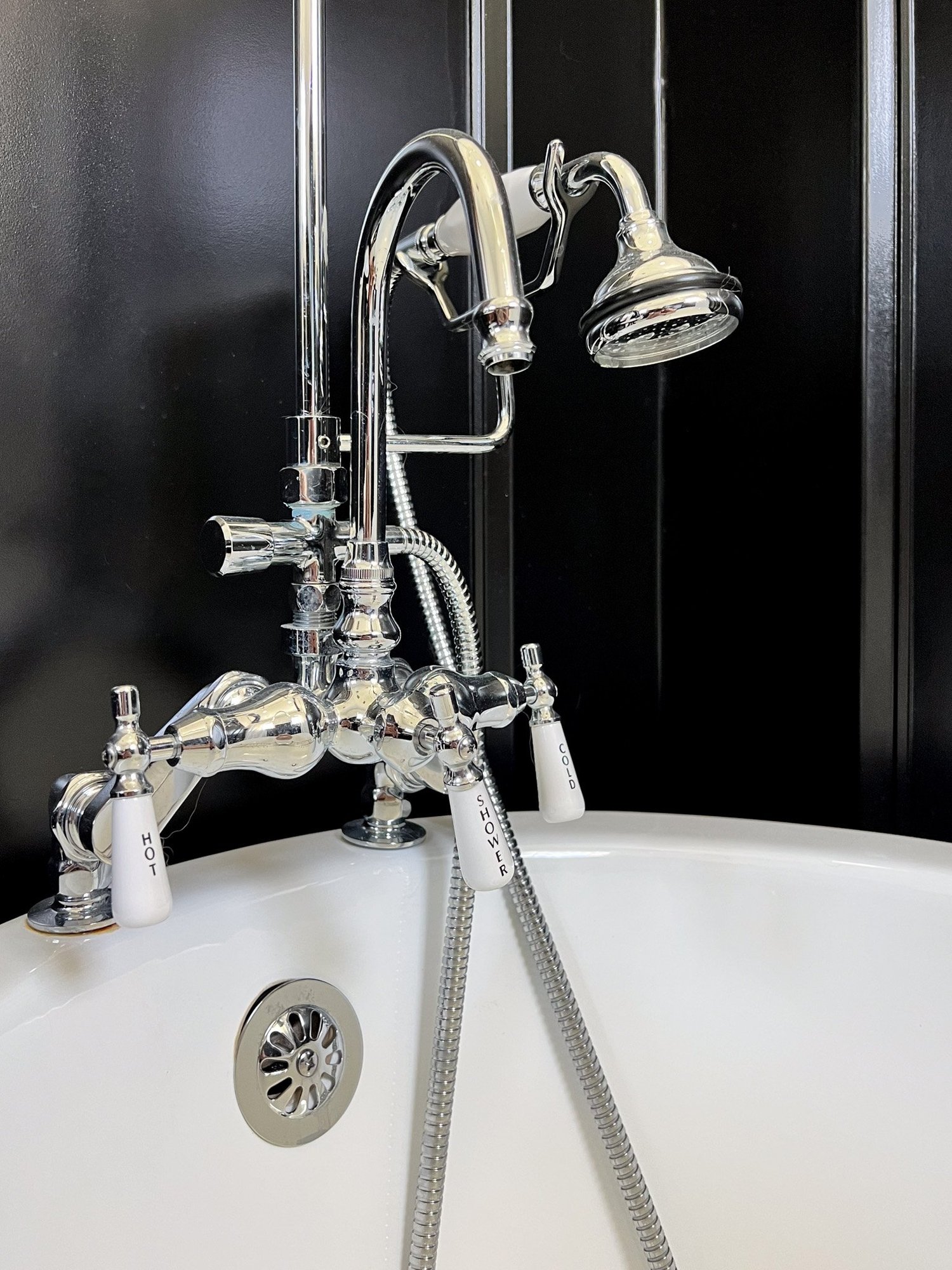 Chrome fixtures and Italian marble table