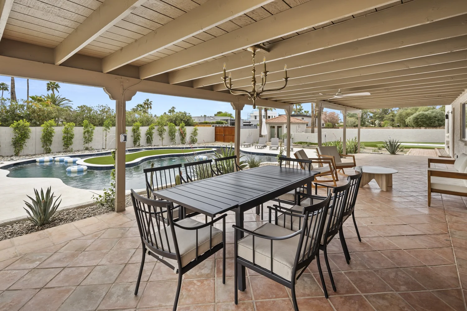 Pool and outdoor living designed for Arizona climate with intentional shade and material choices