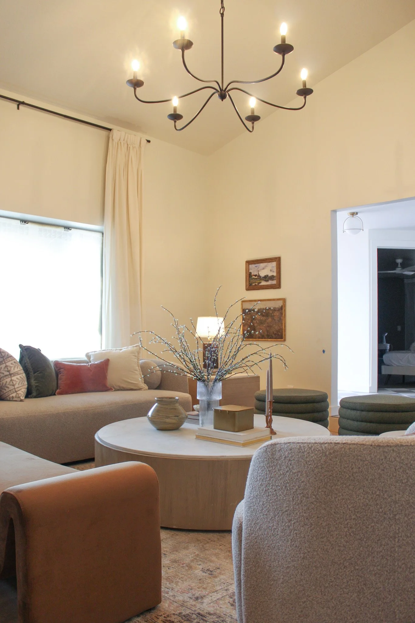 Custom living room design with commissioned art and bespoke furniture arrangement