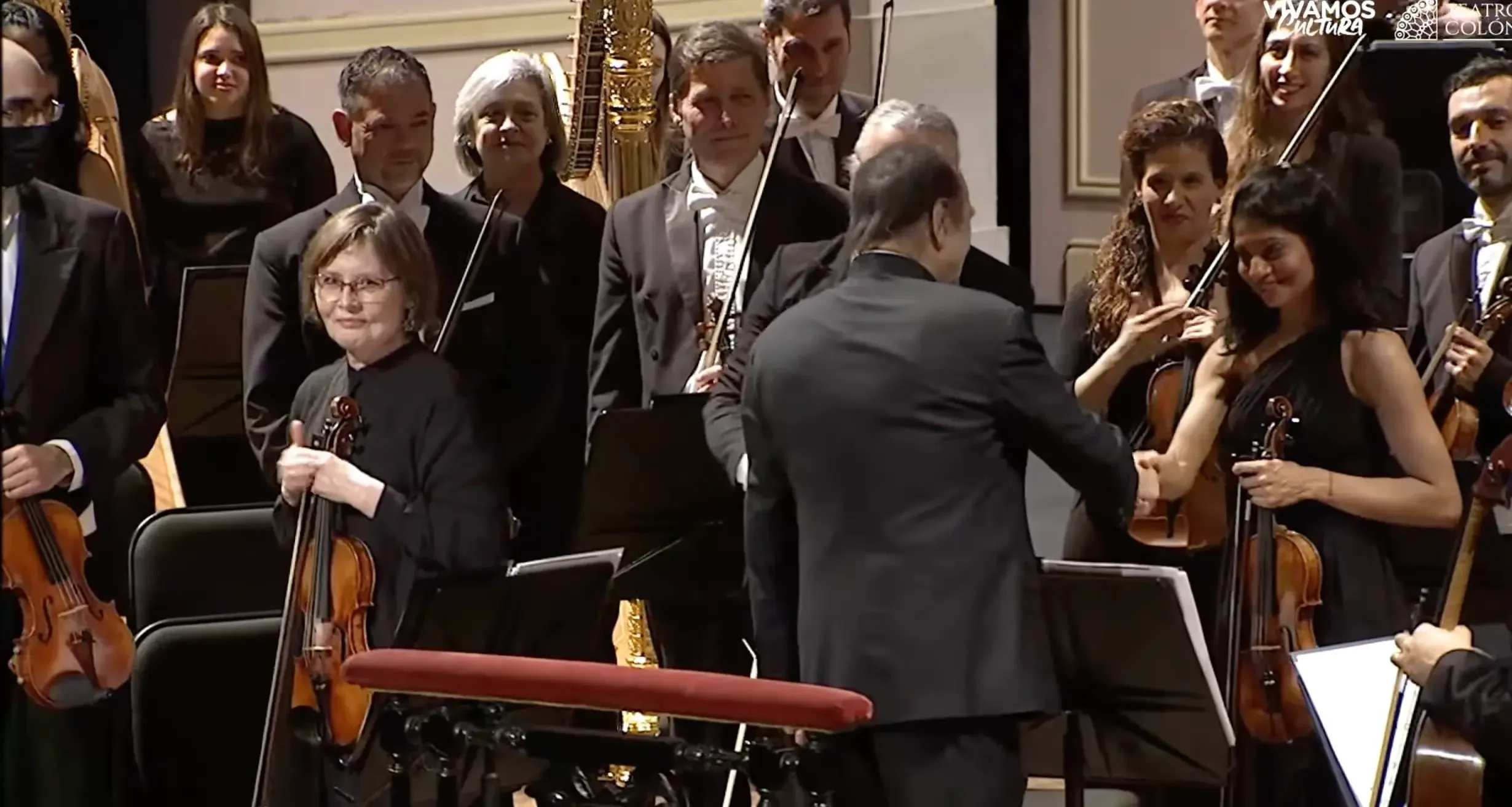 Nelly Guevara shaking hands with conductor Charles Dutoit after a concert in Buenos Aires, Argentina
