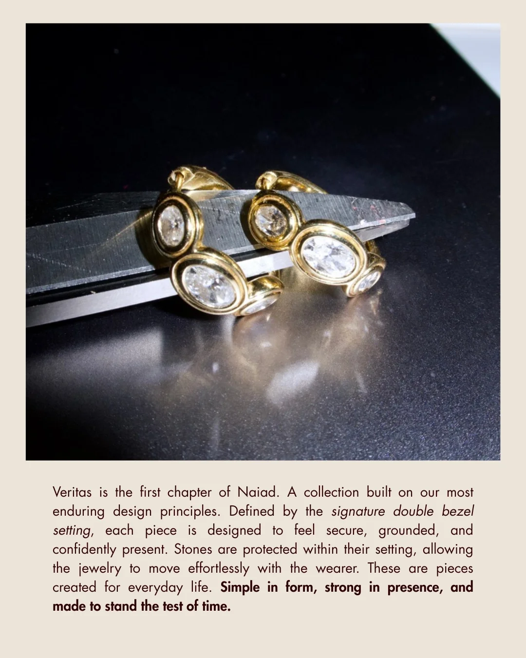 Gold jewelry with multiple diamonds displayed on a silver surface