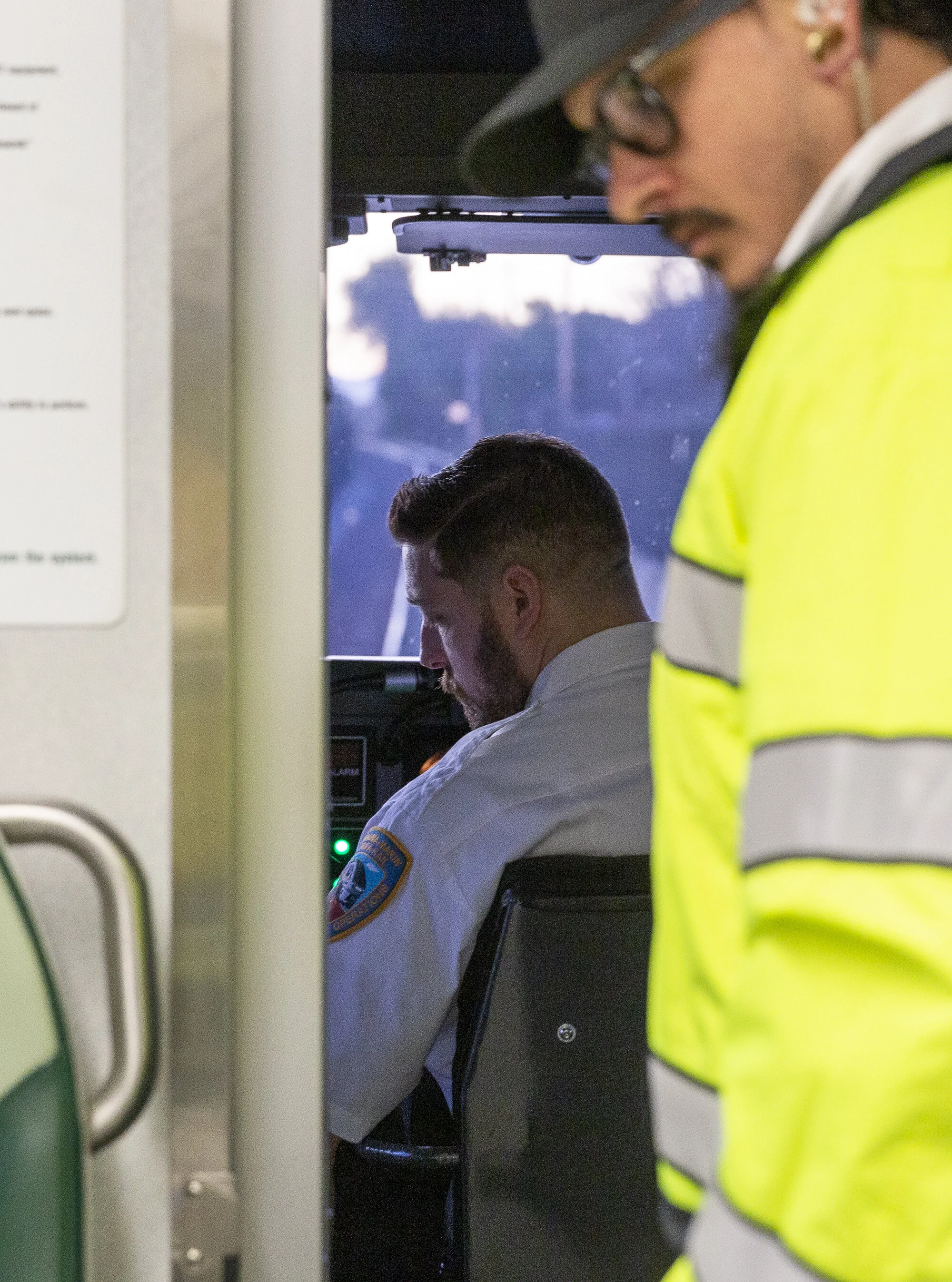Ryan Aranda (left) in the cab changing switches, preparing to move the train forward, Joseph Torrigino-Baca (right) observes on Jan. 5, 2020, in Santa Rosa, CA. (Photo: Genesis Botello)