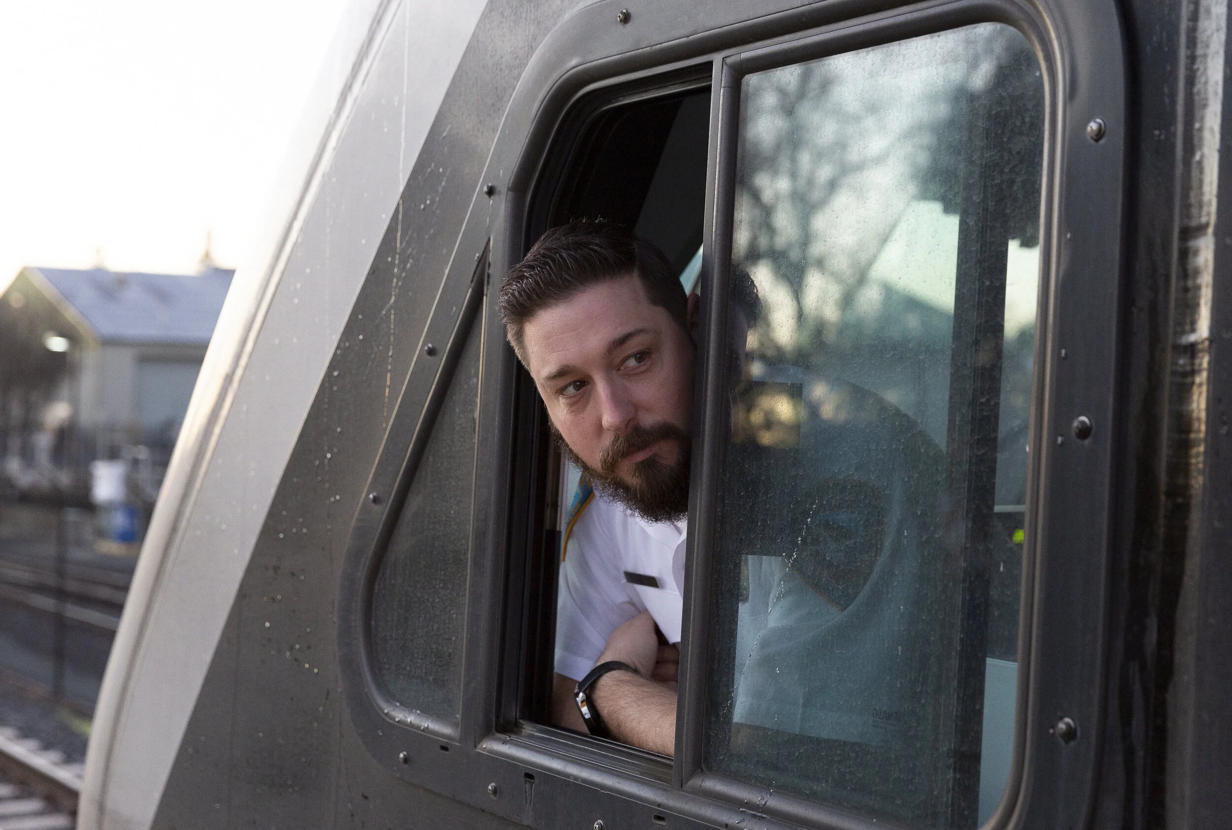 Conductor-Engineer, Ryan Aranda, looking out towards the Santa Rosa Airport station on Jan. 5, 2020, in Santa Rosa, CA. (Photo: Genesis Botello)