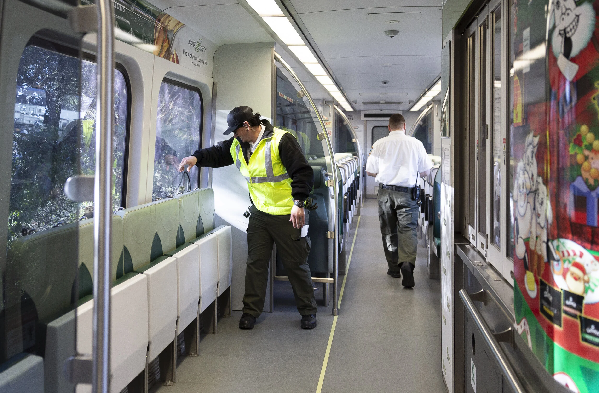Joseph Torrigino-Baca (left) repositions bike bungies at the end of the day on Sunday, Jan. 5, 2020. (Photo: Genesis Botello)
