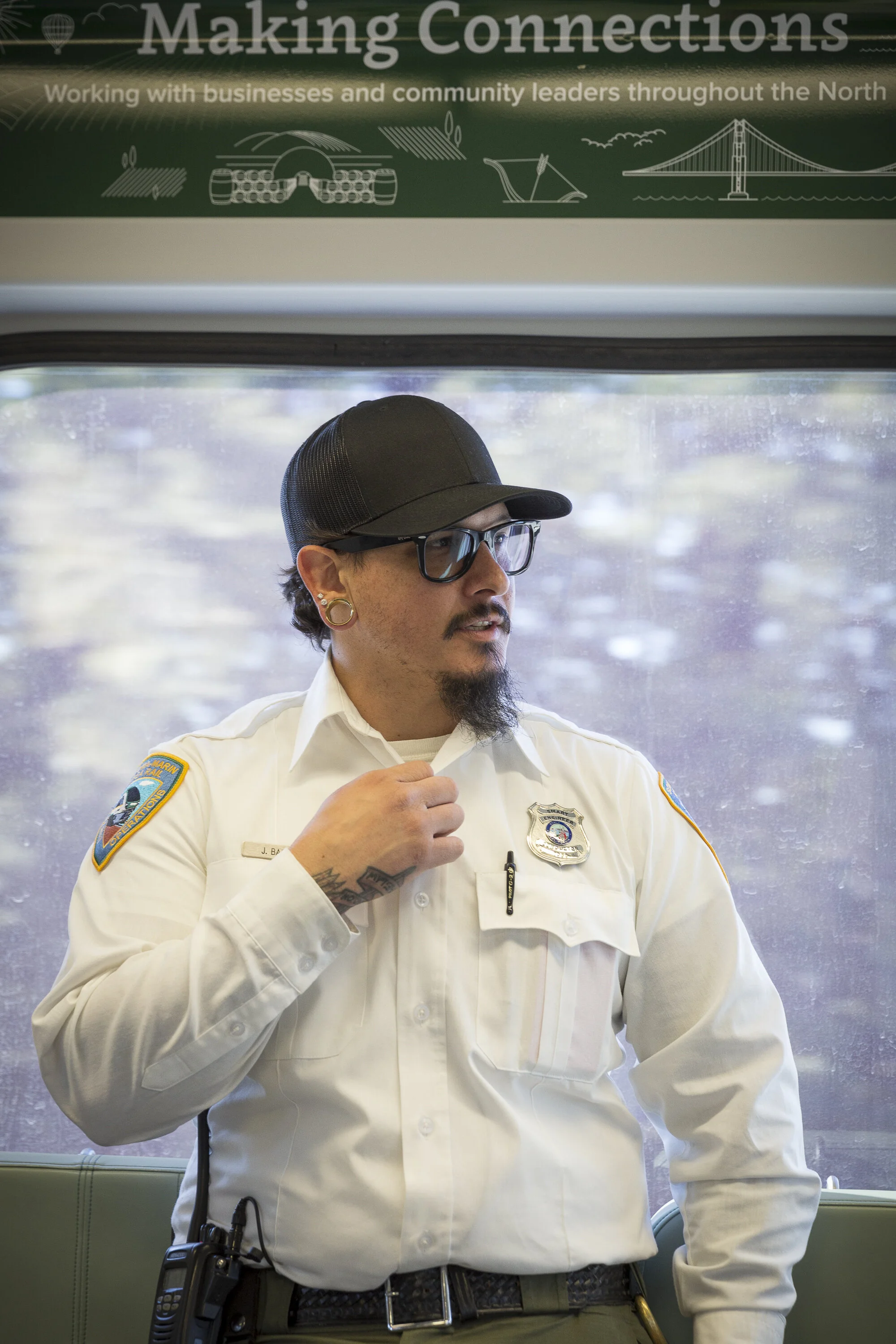 Joseph Torrigino-Baca talking into the earpiece radio on Sunday, Jan. 5, 2020. (Photo: Genesis Botello)