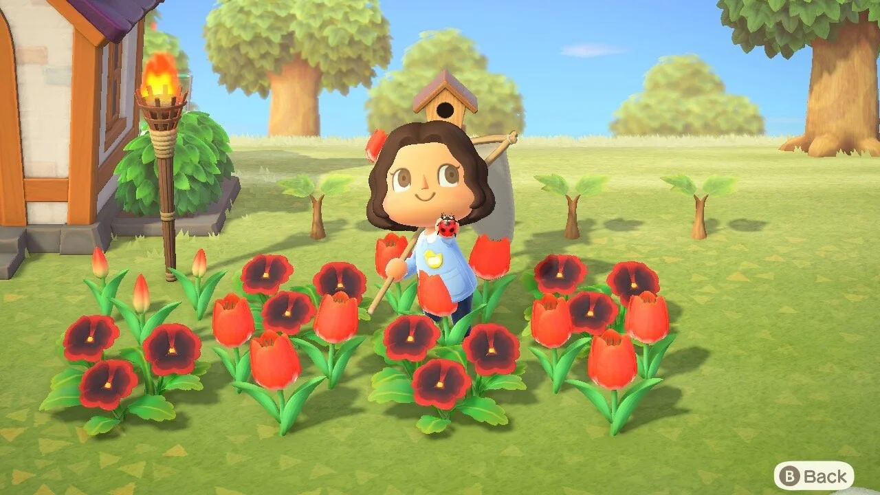 Players savage their virtual island for bugs, hidden items, and resources in the new game "Animal Crossing: New Horizon". (Photo: Genesis Botello)