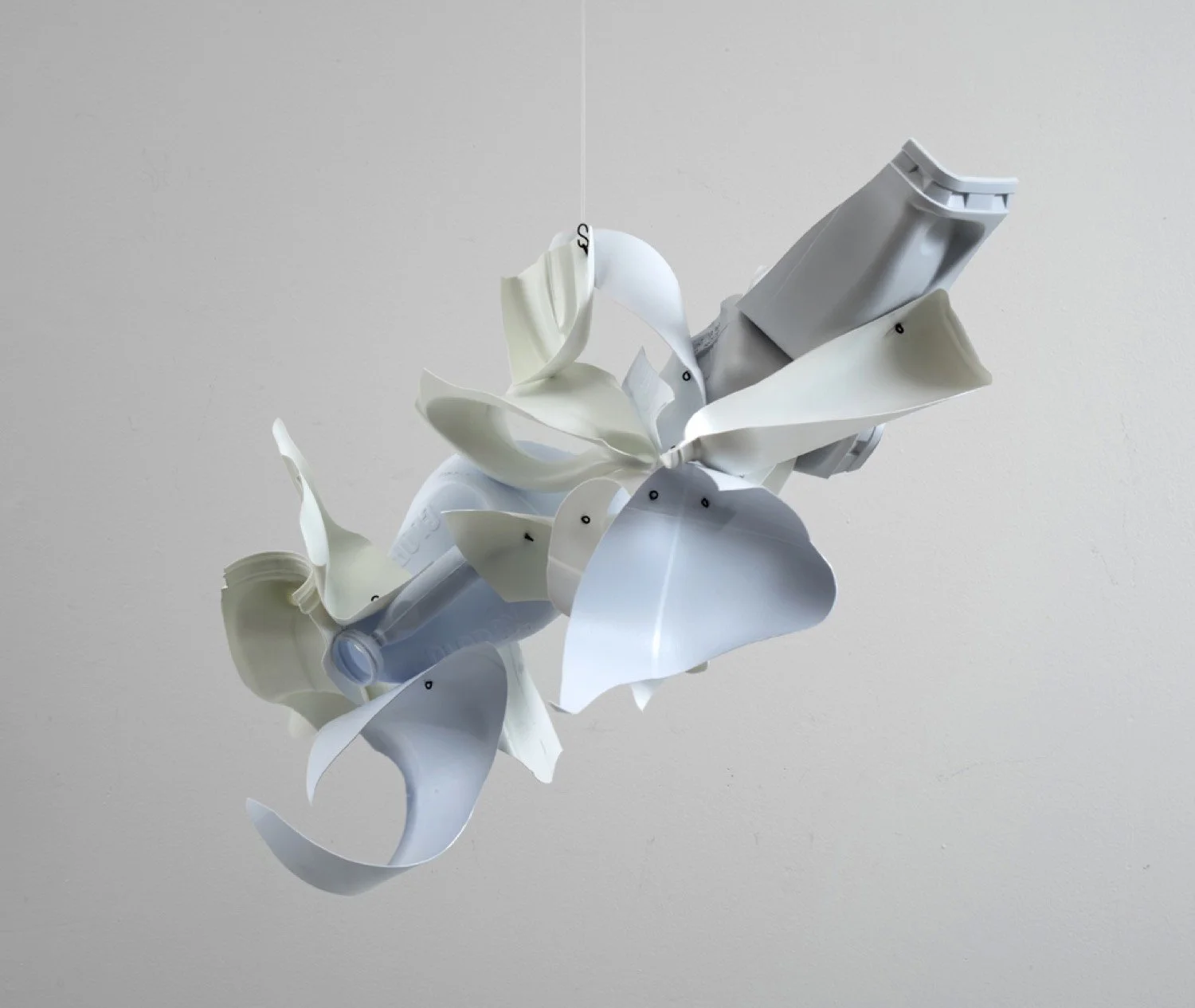 Suspended sculpture made with repurposed plastic bottles