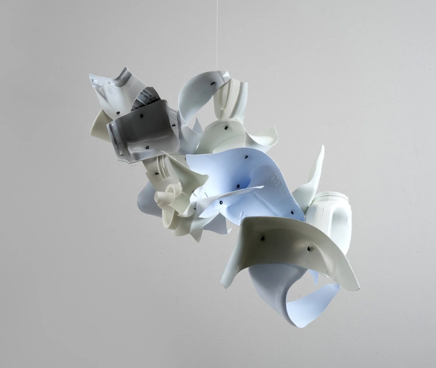 Suspended sculpture made with repurposed plastic bottles