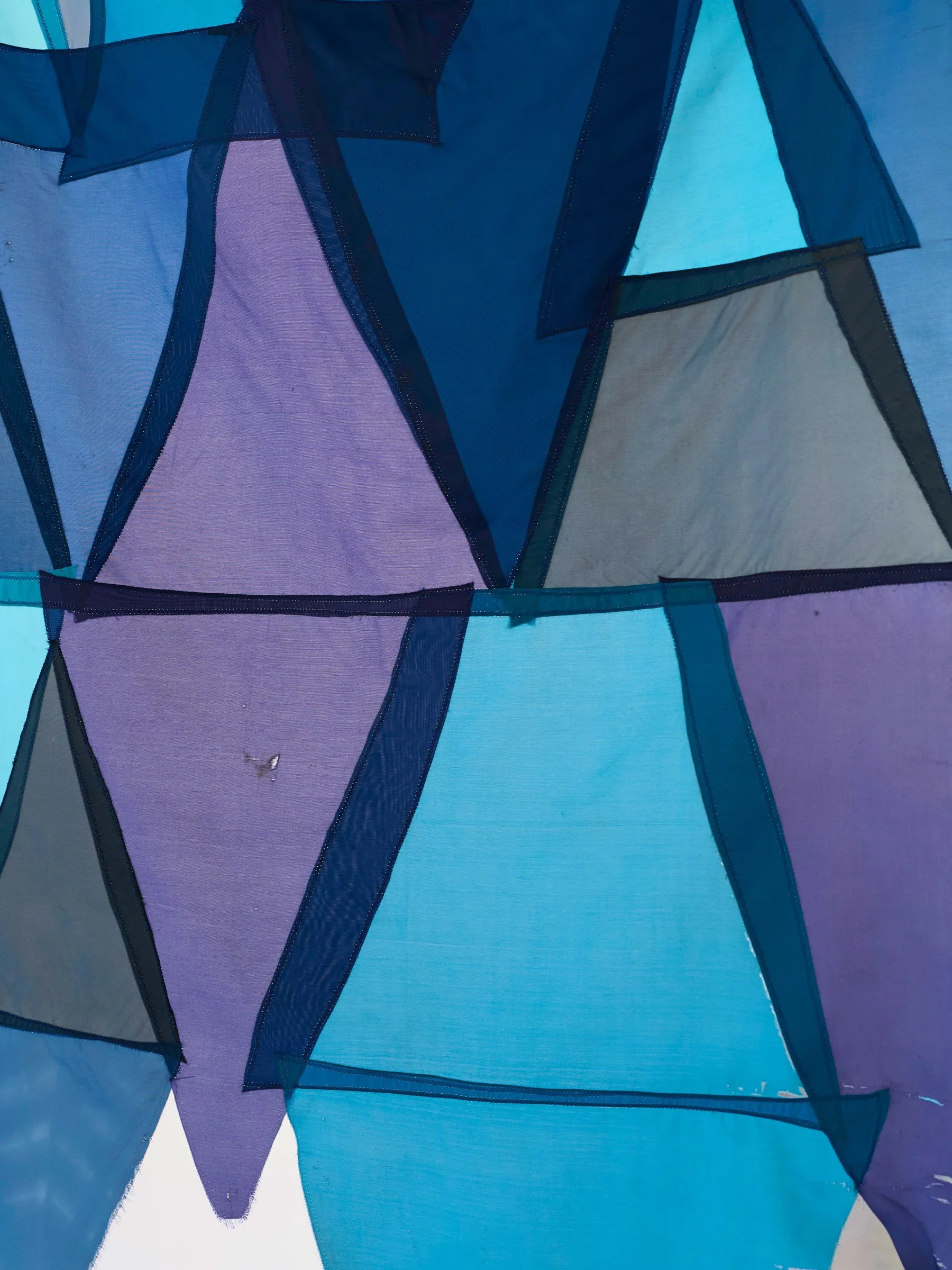 Waste Not Want Not Waterway, detail of translucent blue and purple fabric panels with visible stitching and overlapping forms