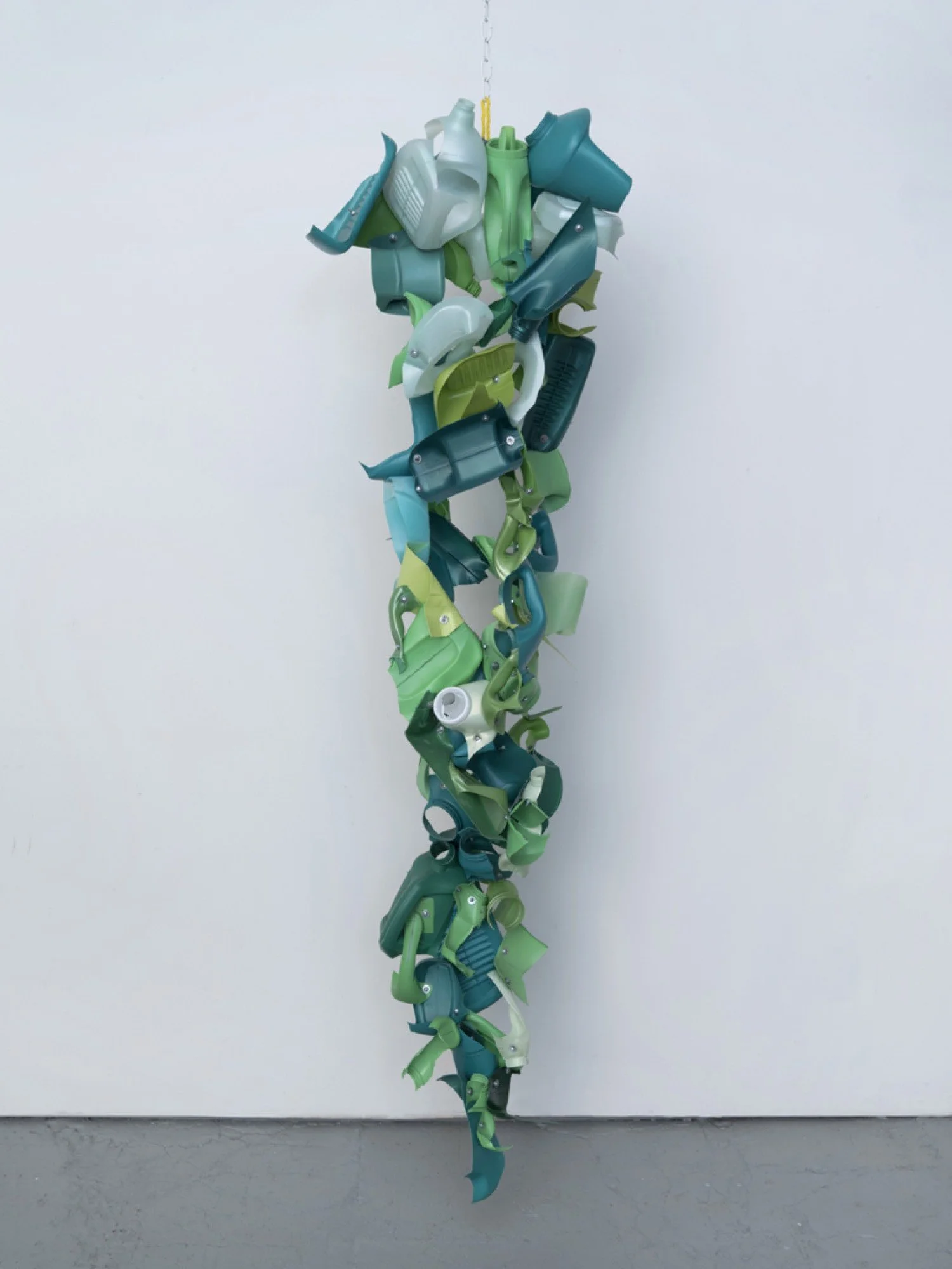Suspended sculpture made from Gain, Purex, and Cascade detergent bottles, machine screws, hex nuts, and nylon rope